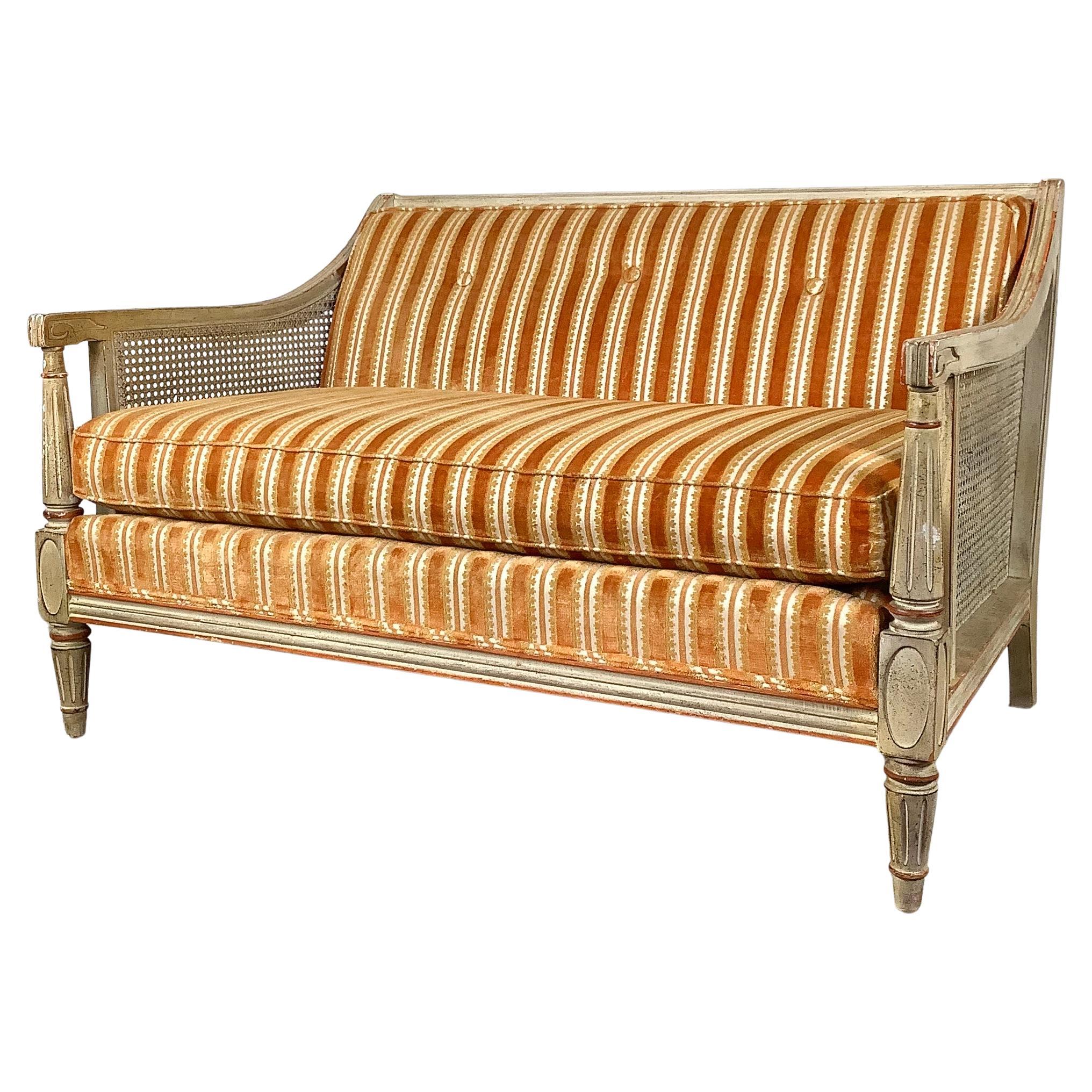 Vintage Cane-Arm Louis XVI Style Settee With Carved Frame