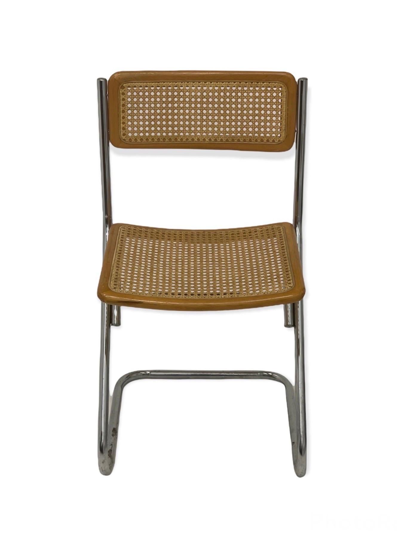 Vintage Cane Metal Chair . Cane is Good Condition.

Dimensions. 18 W ; 17 D ; 32 H

Seat Height. 19
