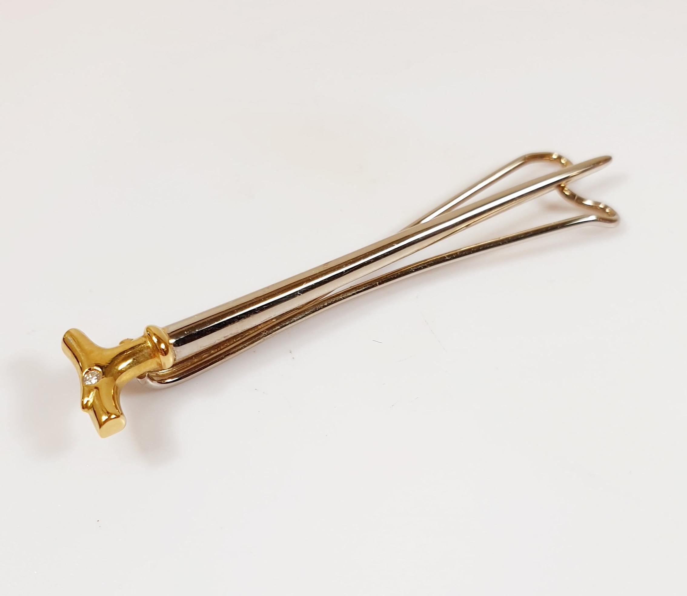  Vintage Cane-shaped Tie Clip in White and Yellow Gold whith a diamond
Measures 5,5 cm/   2,16 inches
Weight 3,7 grams

READY TO SHIP
*Shipment of this piece is not affected by COVID-19. Orders welcome!

PRADERA is a second generation of a family