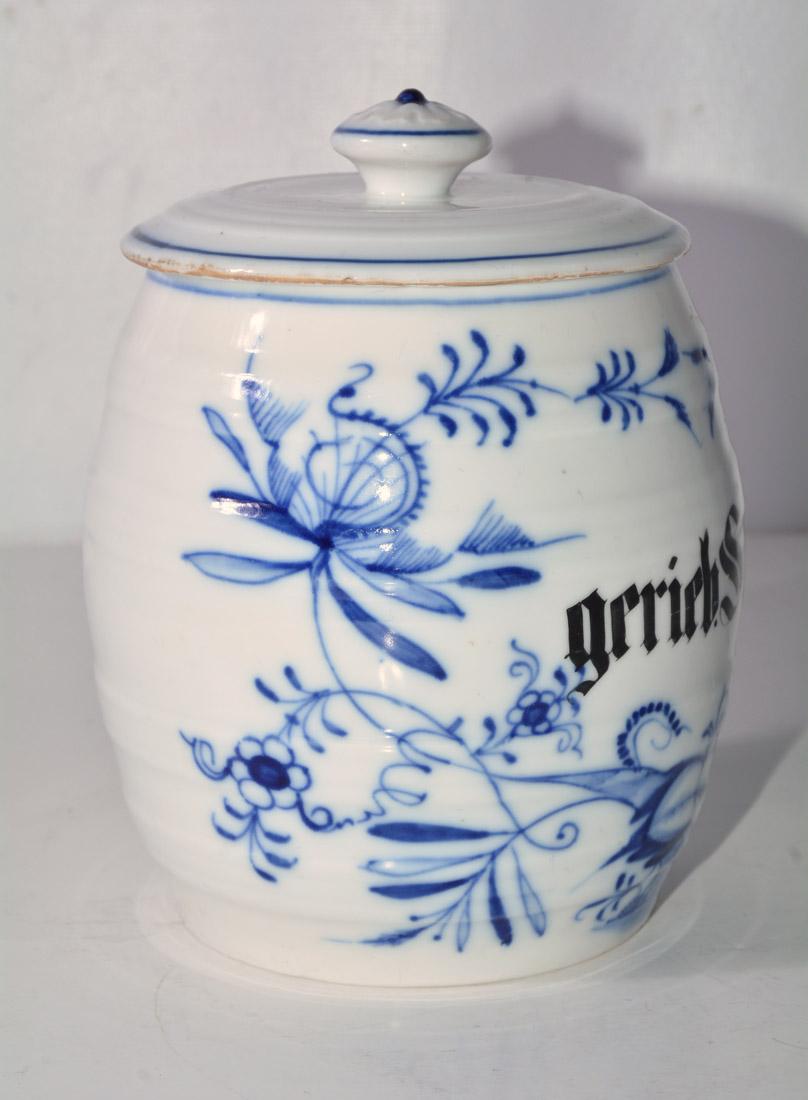 Vintage German blue floral and white canister labeled Gerieb Semel. Barrel shape and lid.

 