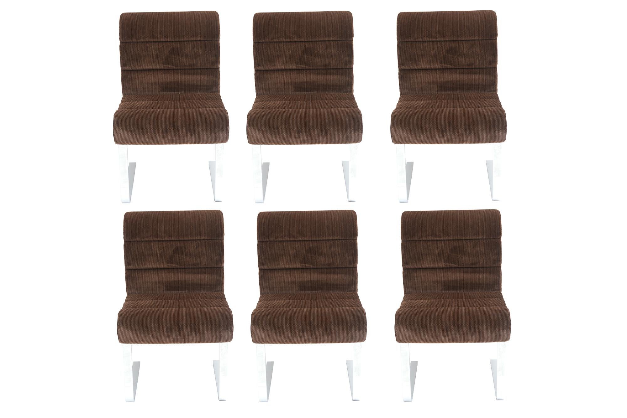 These vintage Italian set of 6 cantilevered Lugano dining chairs by Leon Rosen for Pace Italy were produced by Frank Mariani Italy in the 70's as shown labeled in one of the photos. Mariani was a speciality Italian design division of Pace. They have