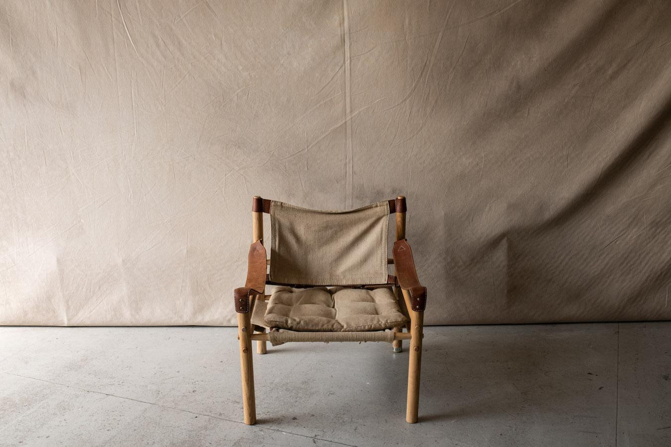 Vintage Canvas Arne Norell Lounge Chair From Sweden, Circa 1970  Original canvas and leather upholstery on an ash frame.  Designed by Arne Norell, produced by Arne Norell AB in Aneby, Sweden

We don't have the time to write an exhausting description