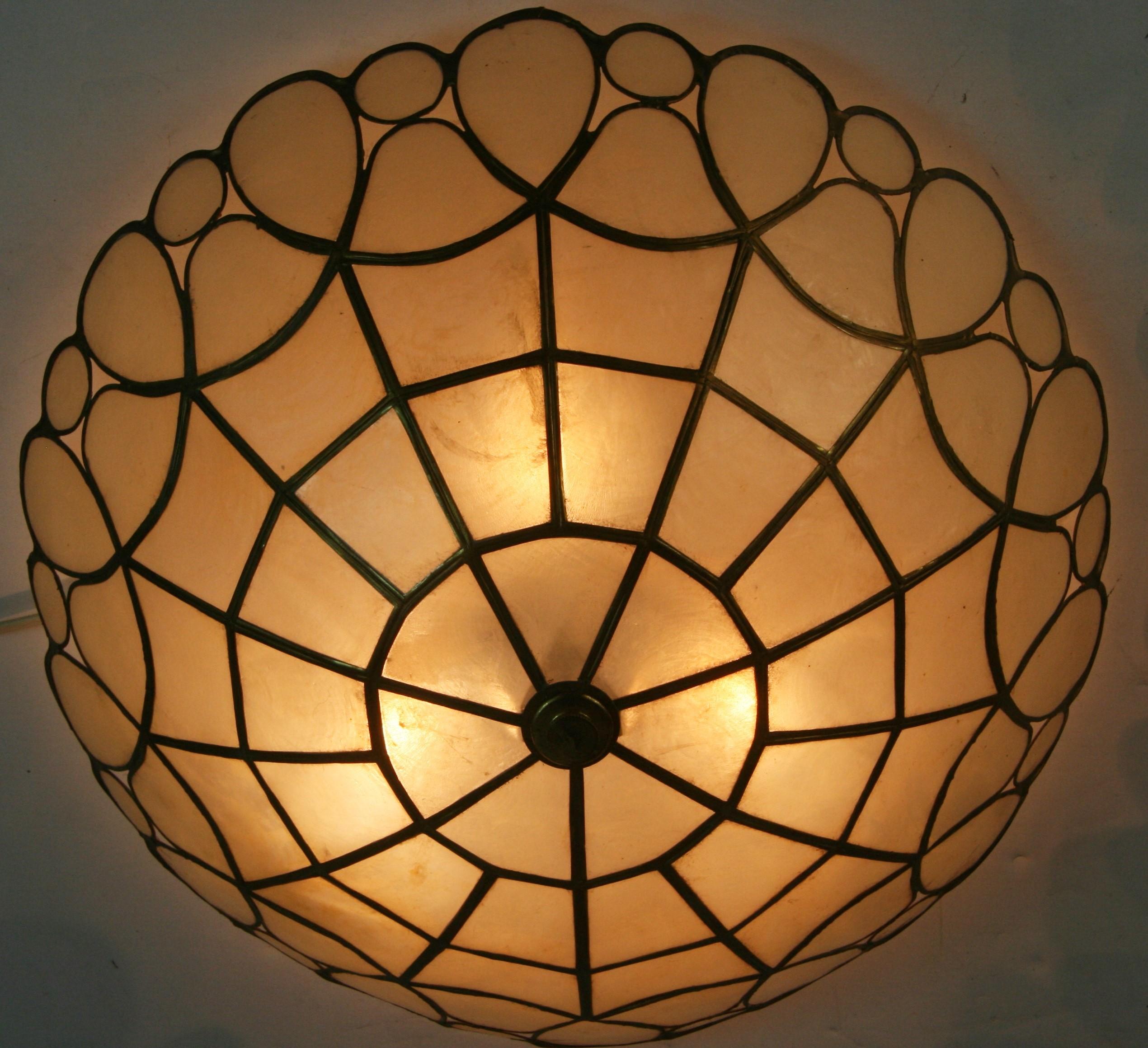 1841 Vintage capiz shell flushmount
Takes 3 40 watt Edison based bulbs