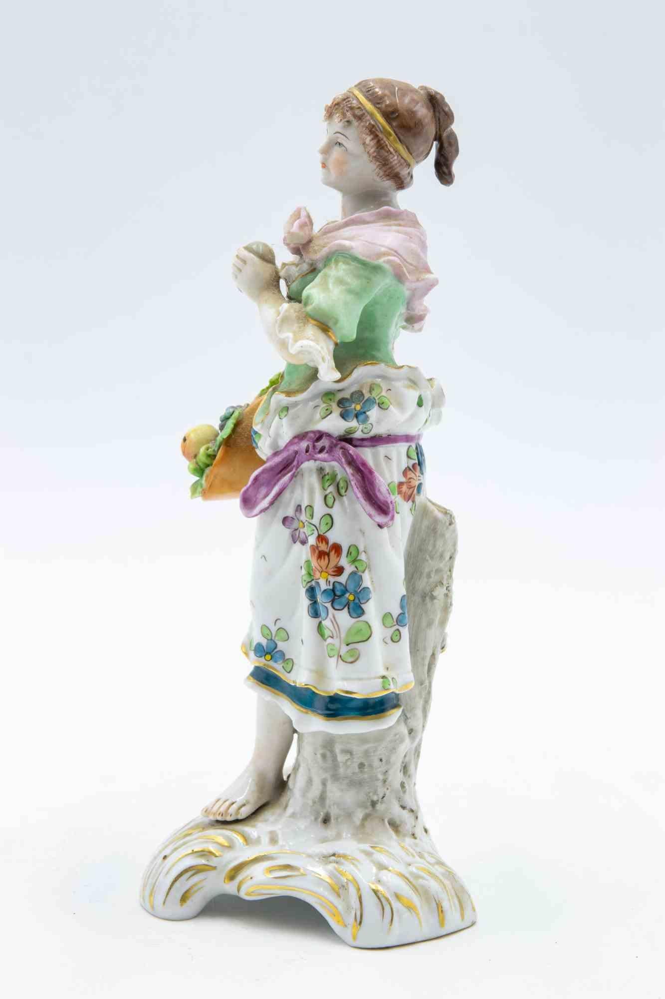 Vintage ceramic sculpture of young woman by Ceramiche Capodimonte.

Factory's stamp on bottom.

Very good condition.