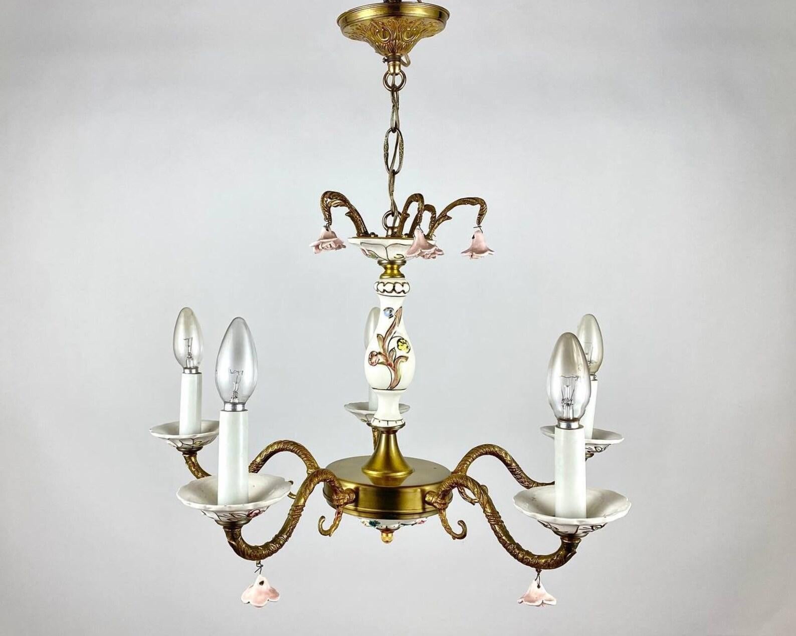Rare vintage chandelier with 5 arms and a pair of wall sconces. Capodimonte. Made of brass and art porcelain.

 Made in Italy. 

 Its design is distinguished by the use of hand-painted ceramics. For the luminaire, such a luxurious material as