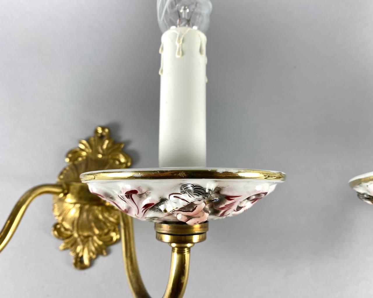 Italian Vintage Capodimonte Porcelain Wall Sconces with Putti and Floral Pattern, 1980 For Sale