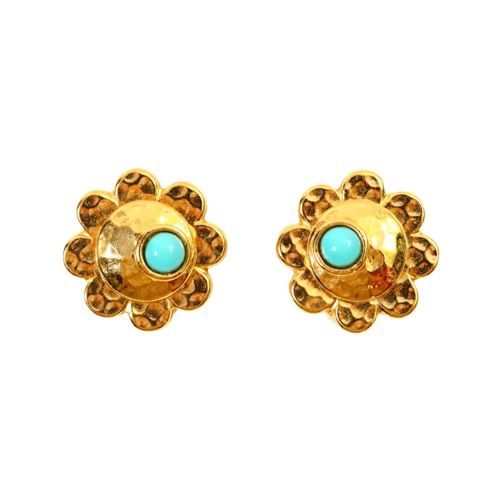 Vintage Carita Paris Gold with Faux Turquoise Earrings Circa 1980s.  Classic and Chic earrings that go with most things and yes you can wear them in the winter. Clip on.

Bracelet to match on site!