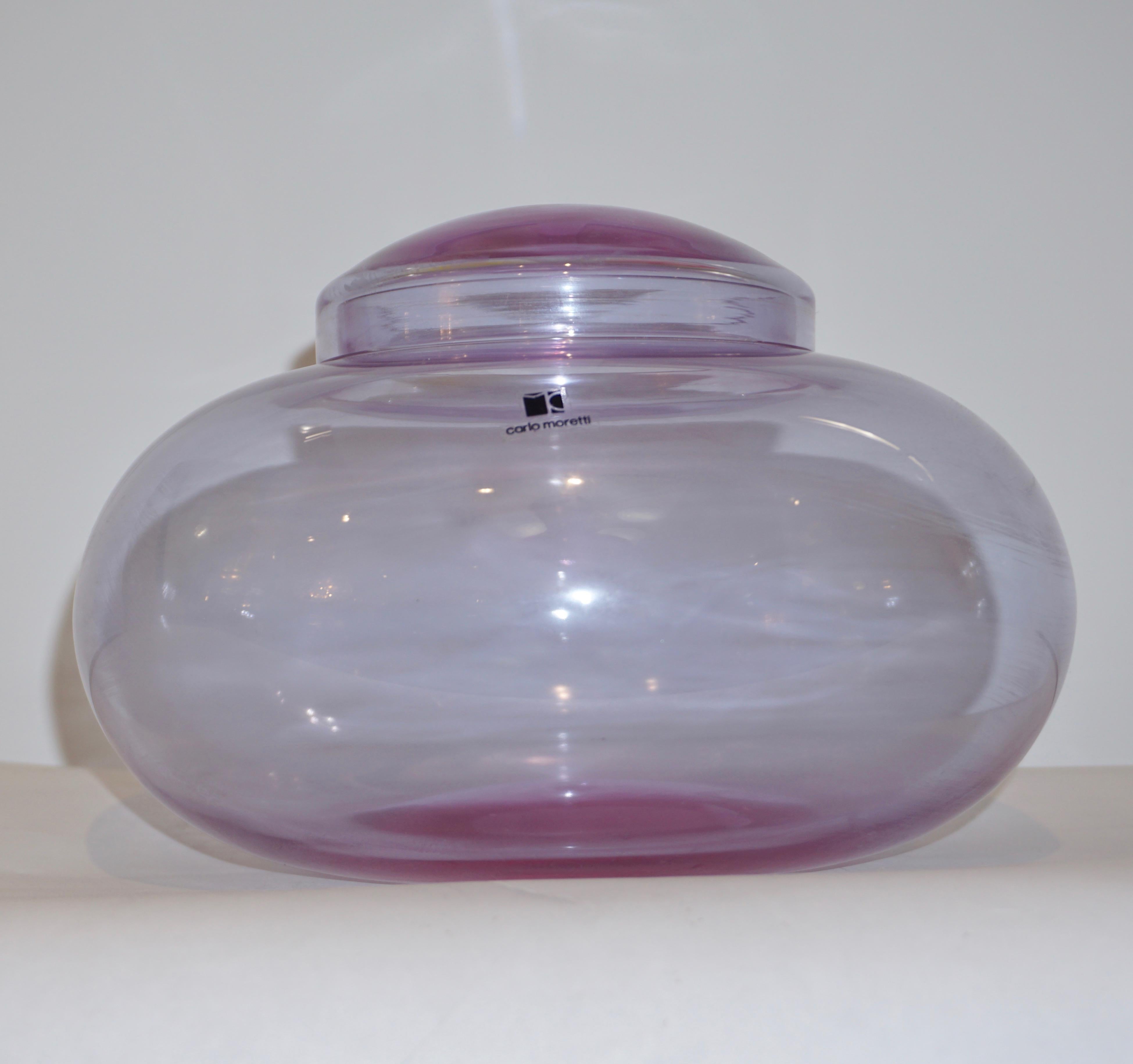Vintage decorative box / vase with cover or jar made in blown Alexandrite purple blue Murano crystal glass, designed and signed by Carlo Moretti. Alexandrite is described as “emerald by day, ruby by night