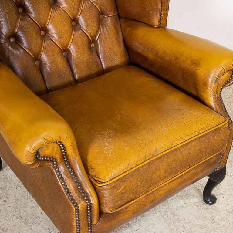 20th Century Vintage Carmel Brown Leather Chesterfield Wingback Arm Chair from England