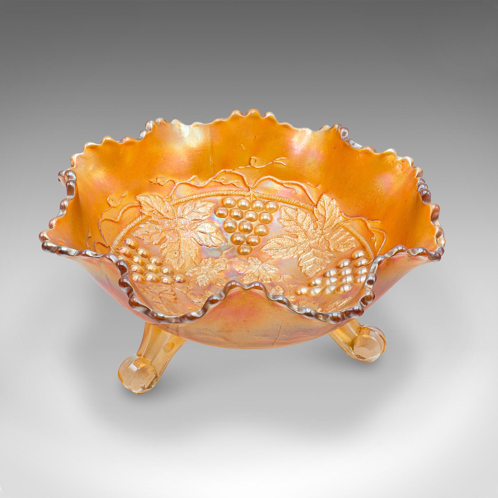 
This is a vintage carnival bowl. An English, lustre glass decorative confectionery dish, dating to the early 20th century, circa 1930.

Lustre and warm amber hues adorn this charming bowl
Displaying a desirable aged patina and in good order
Orange