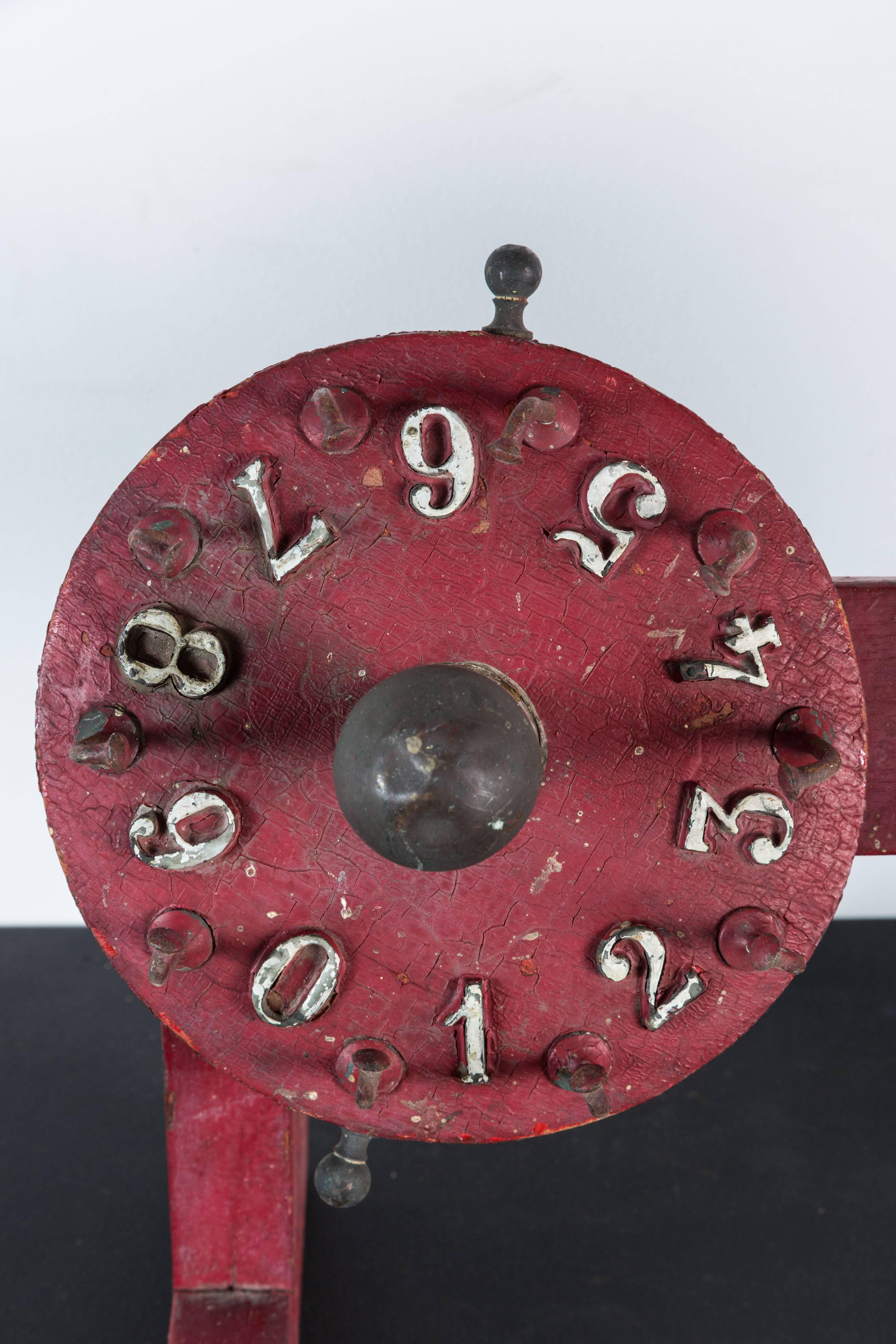 Vintage double game wheel found in the south. Carnival midway or perhaps for table gambling. Original red paint surface. Both wheels spin freely.