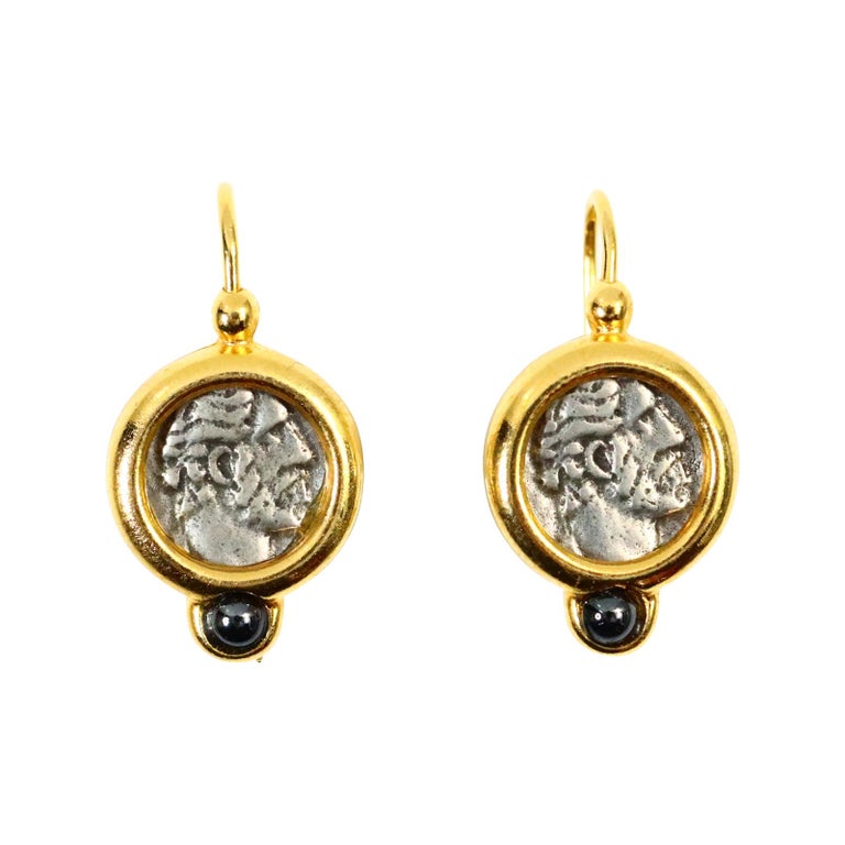 Vintage Carolee Coin Drops in Silver and Gold with Black Stone.  Has Greek or Roman looking face and rounded wires for wearing. Classic piece.