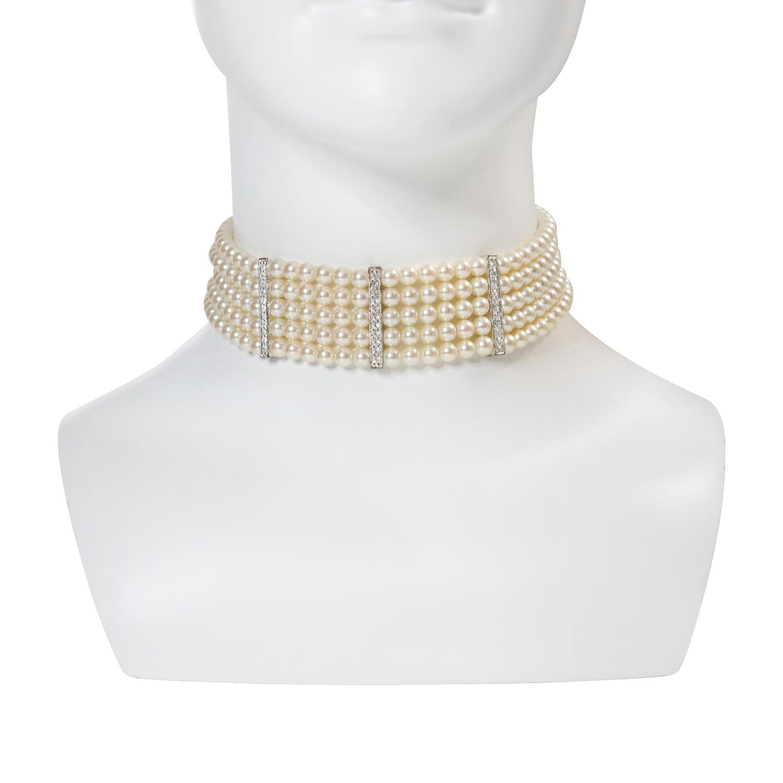 Vintage Carolee Faux Pearl Choker With Diamante circa 1980s. This well made choker is in great condition. Has 5 rows of faux heavy pearls with three rows of diamante spacers and two rows of the same that make up the closure in the back. There is