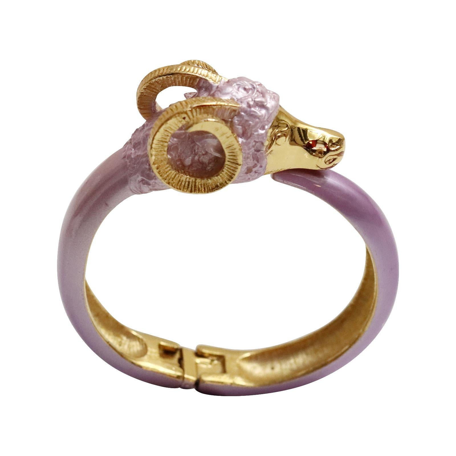 Vintage Carolee Gold Tone and Pink Rams Head Bracelet, Circa 1980s. This bracelet has a fun look and can be worn alone or stacked with other bracelets, from pearls to Art Deco bracelets or Cartier-styled stacked bracelets.  Worn day or night.  Makes