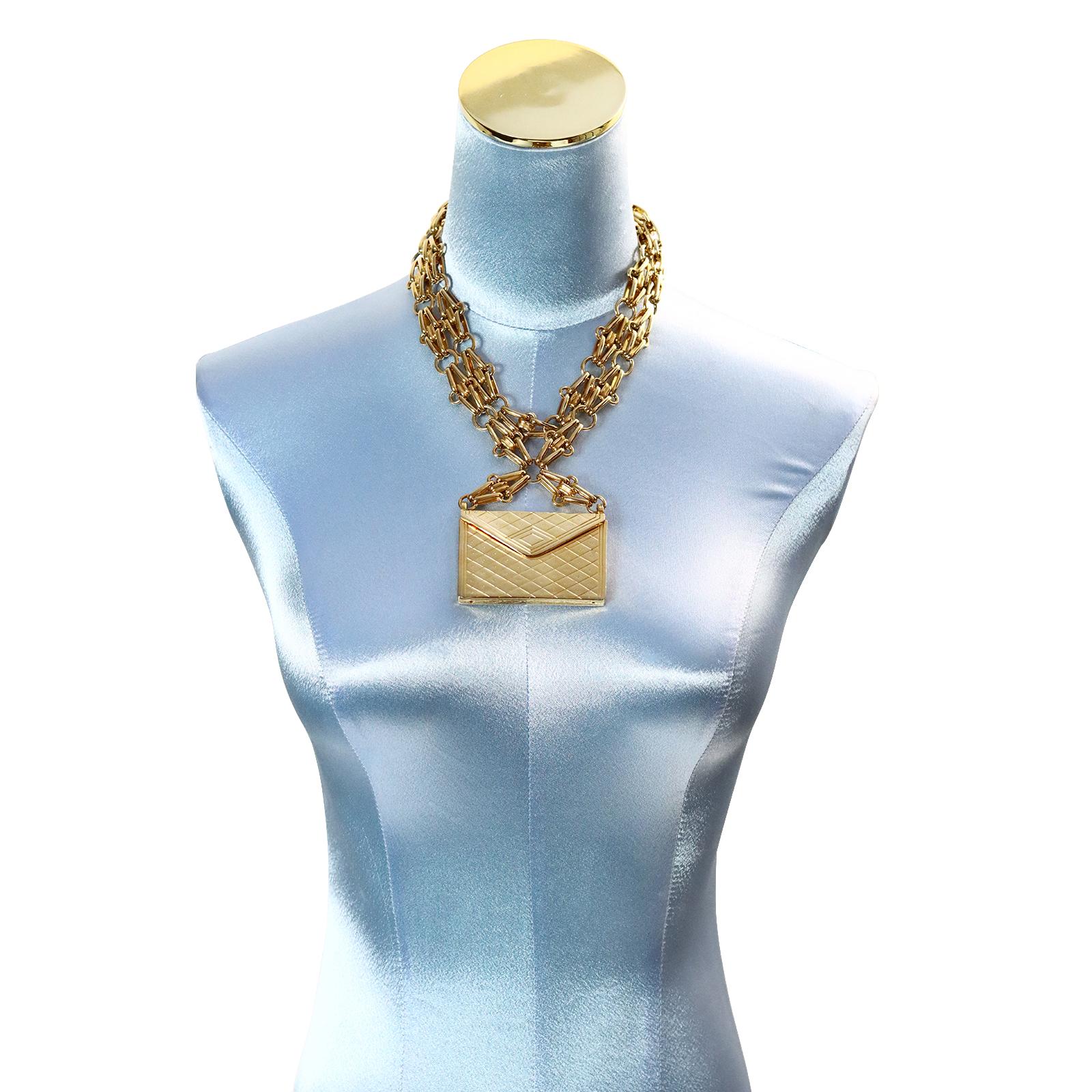Vintage Carolee Gold Tone Long Purse Necklace Circa 1980s. This looks great doubled or worn one piece against the neck.  Right in style today with the micro mini bags.  Only it is 40 years later. Such a talking point.
 The necklace portion is 34