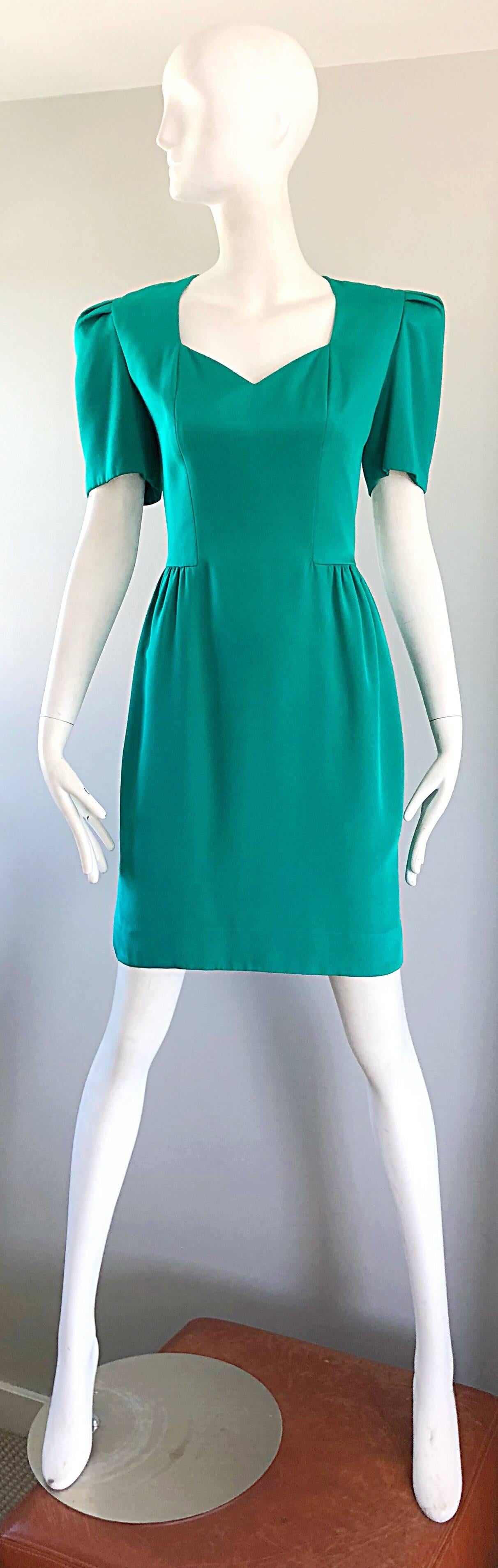 Beautiful vintage late 80s CAROLINA HERRERA kelly green strong shoulder short sleeve dress! Striking vibrant kelly green color. Built in shoulder pads offer just the right amount of drama (this beauty looks like it could be off the current runways