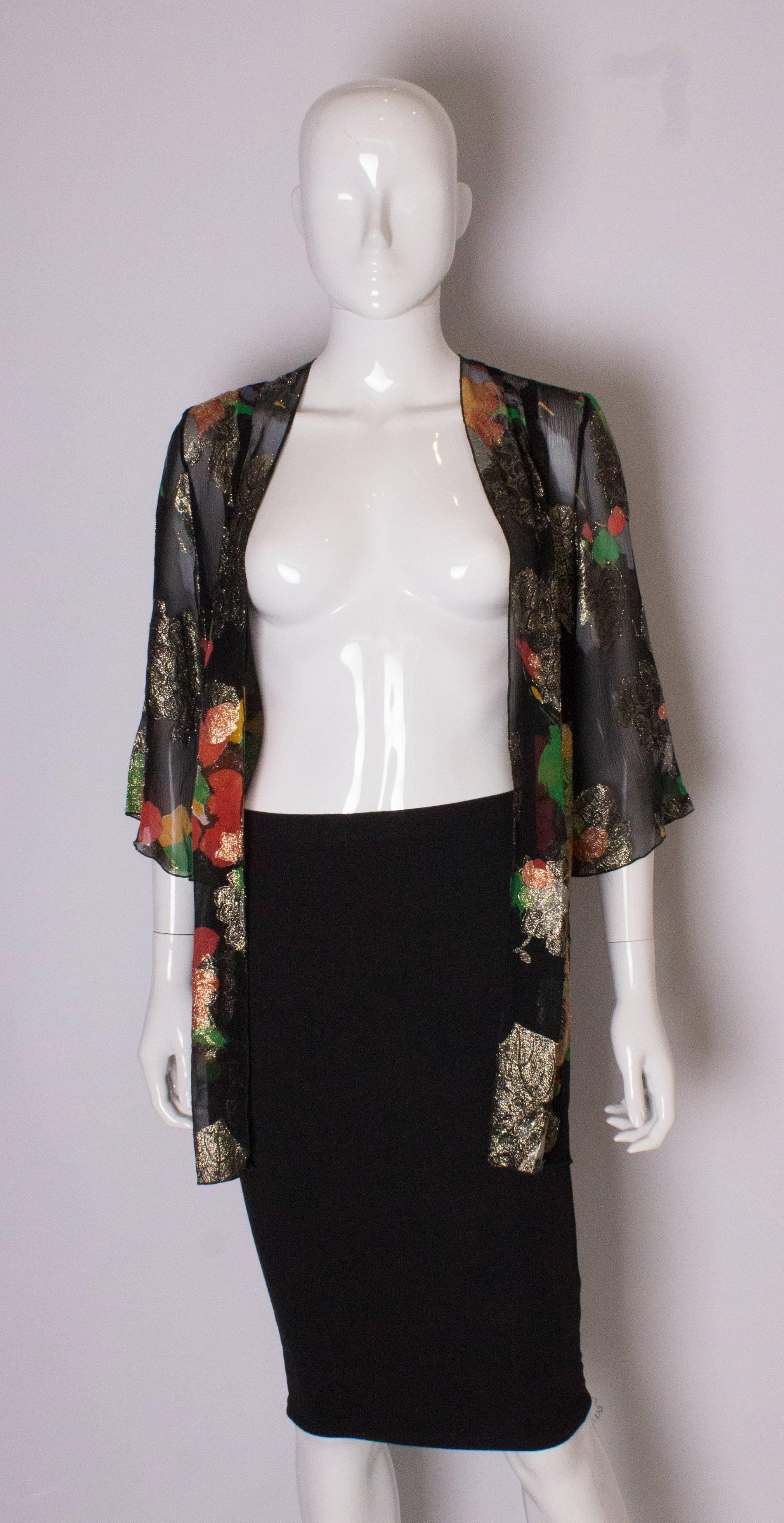 Black A Vintage 1980s lurex floral evening jacket by Caroline Charles 
