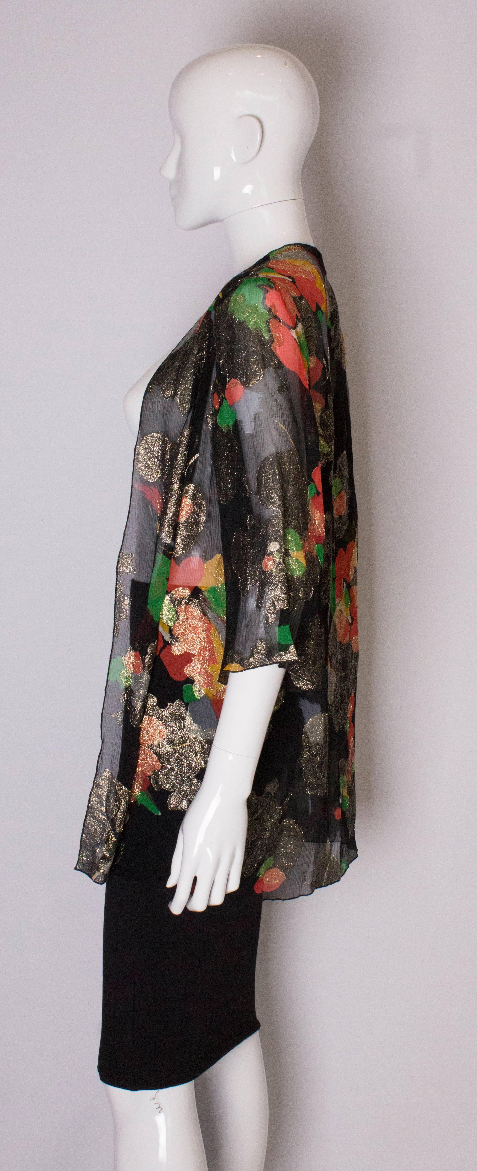 Women's A Vintage 1980s lurex floral evening jacket by Caroline Charles 