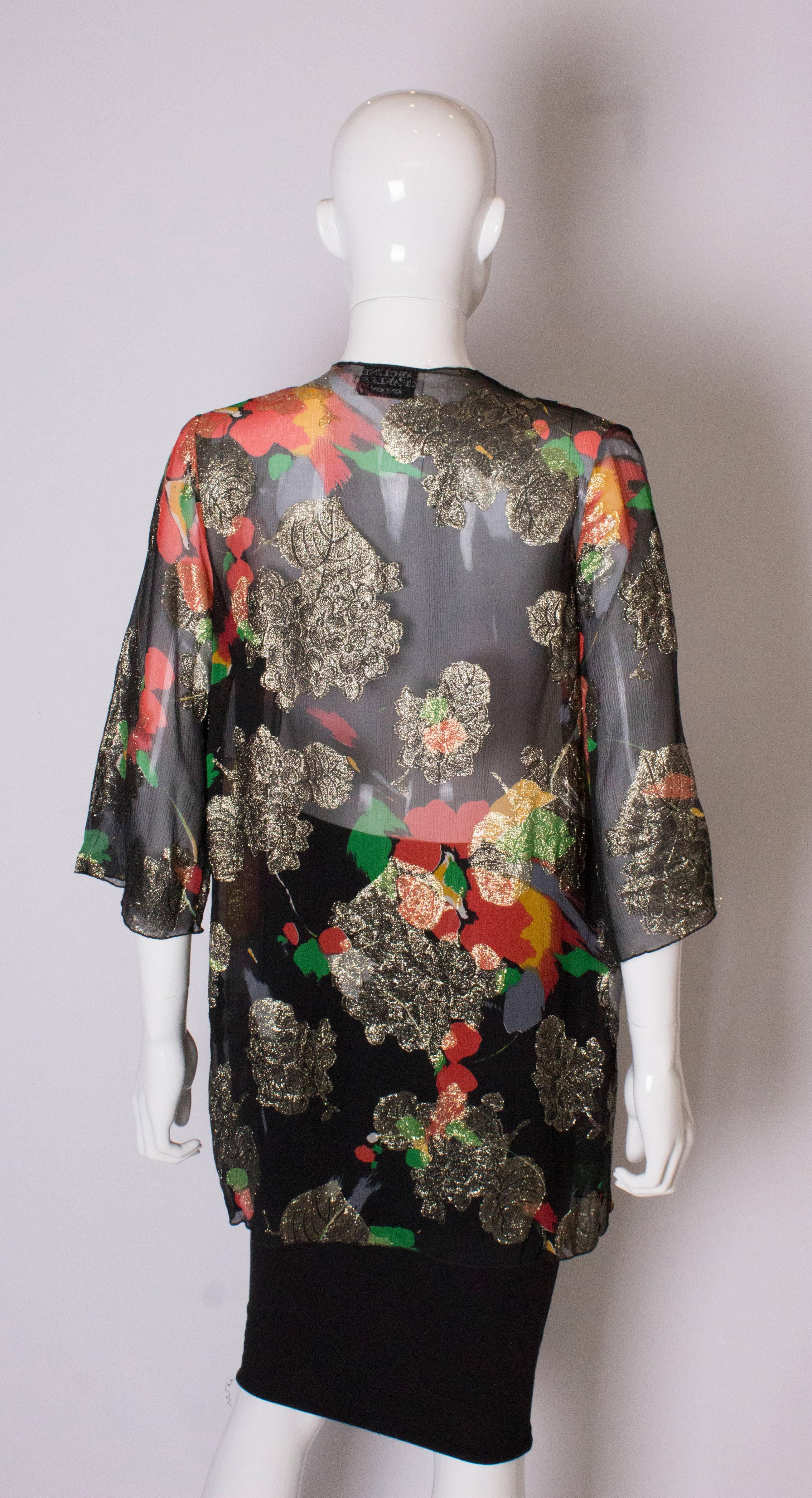 A Vintage 1980s lurex floral evening jacket by Caroline Charles  2
