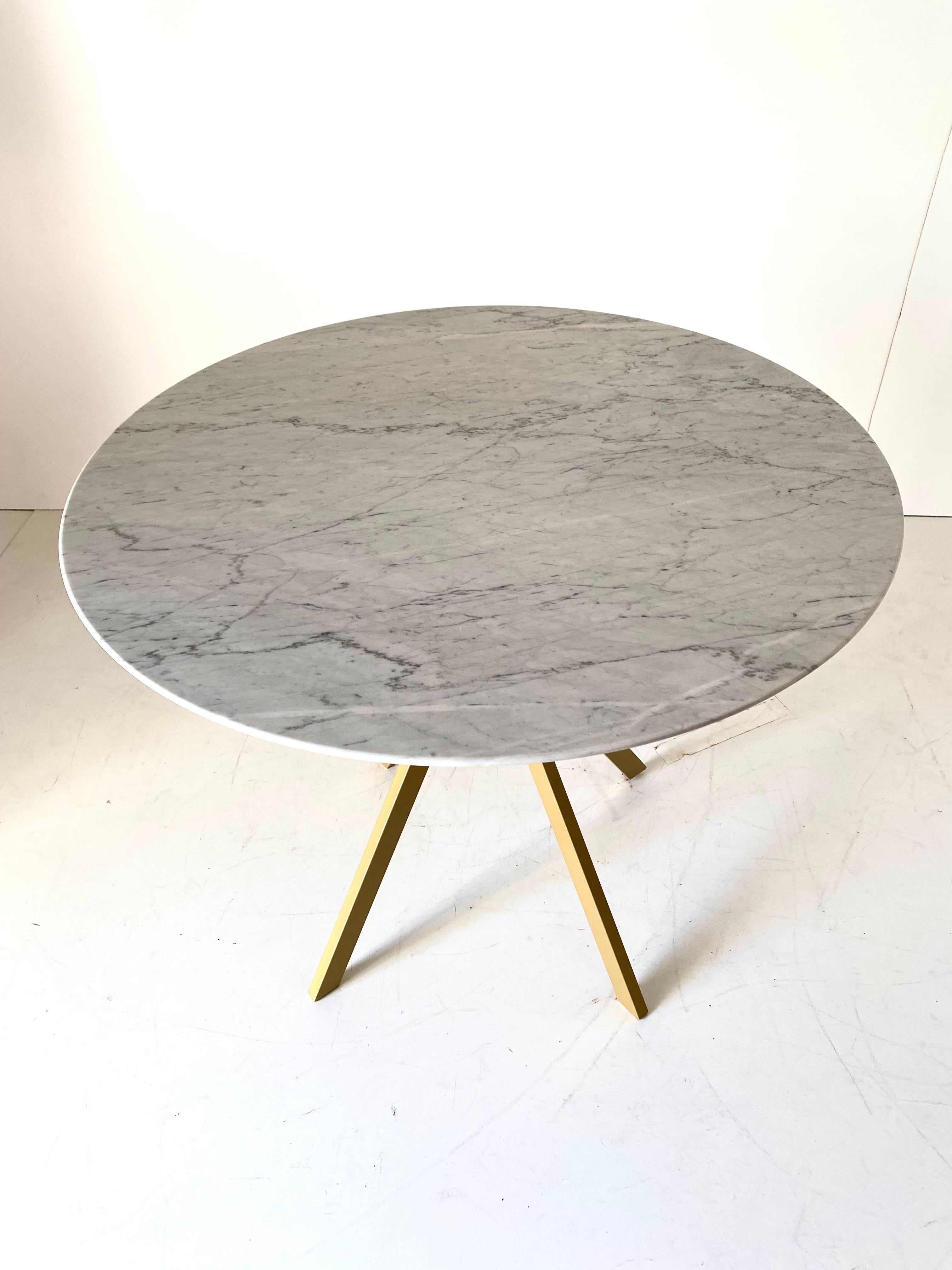 Vintage Carrara marble Dining Table, Italy 1960s
1960s Carrara marble-top round table. Iron structure painted in champagne yellow color. The marble top has been cleaned and polished whilist the iron structure repainted. Suitable for 4 people.
In