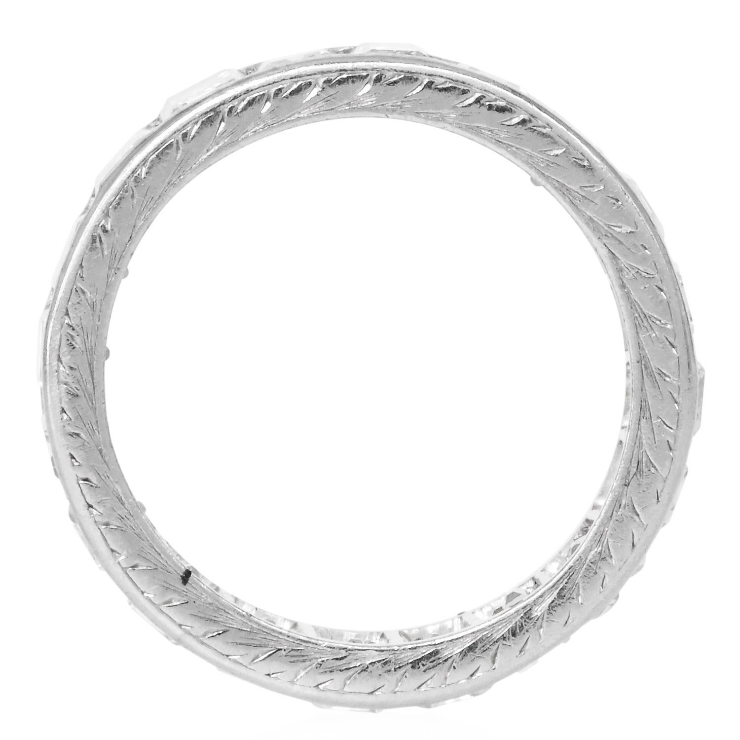 Vintage Carre-Cut Diamond Eternity Band in Hand-Engraved Platinum. The ring features carre-cut natural diamonds, channel-set in a continuous band with a soft, hand-engraved design along the edges. These step-cut diamonds display crisp brilliance and