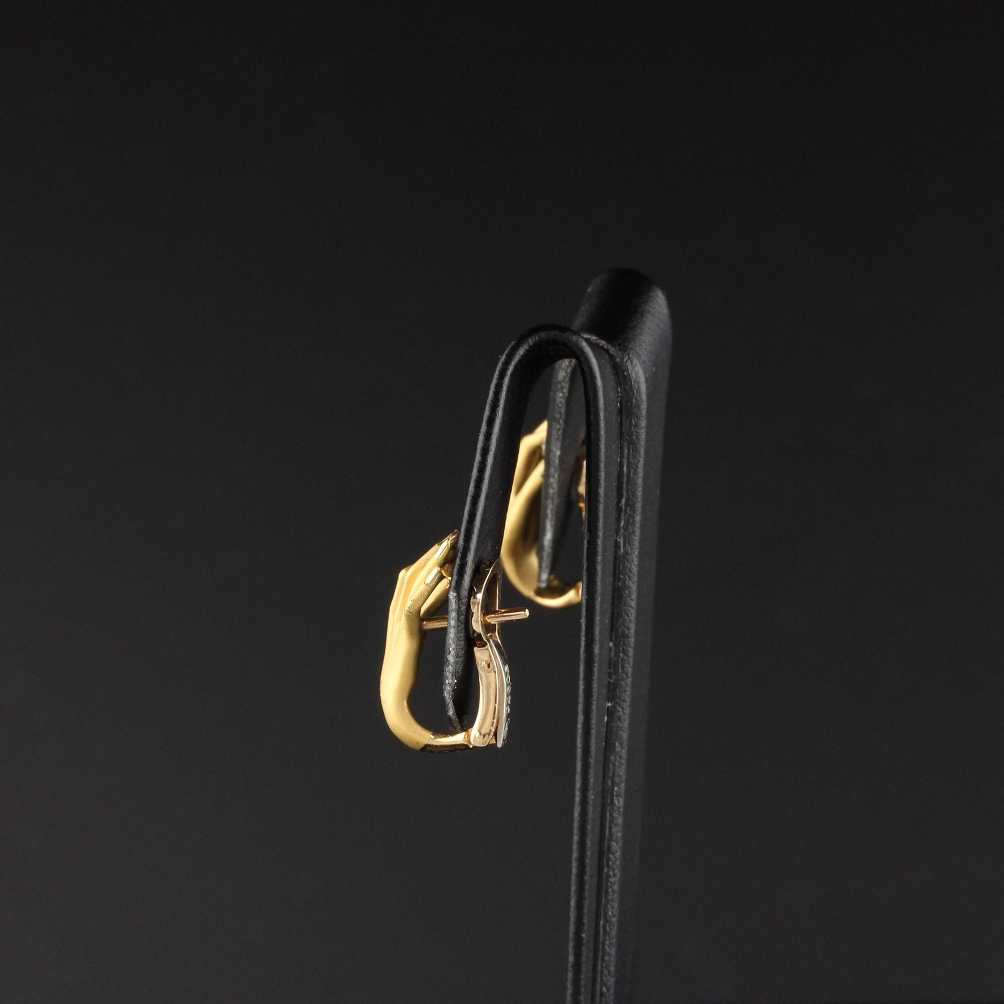 hand earrings gold