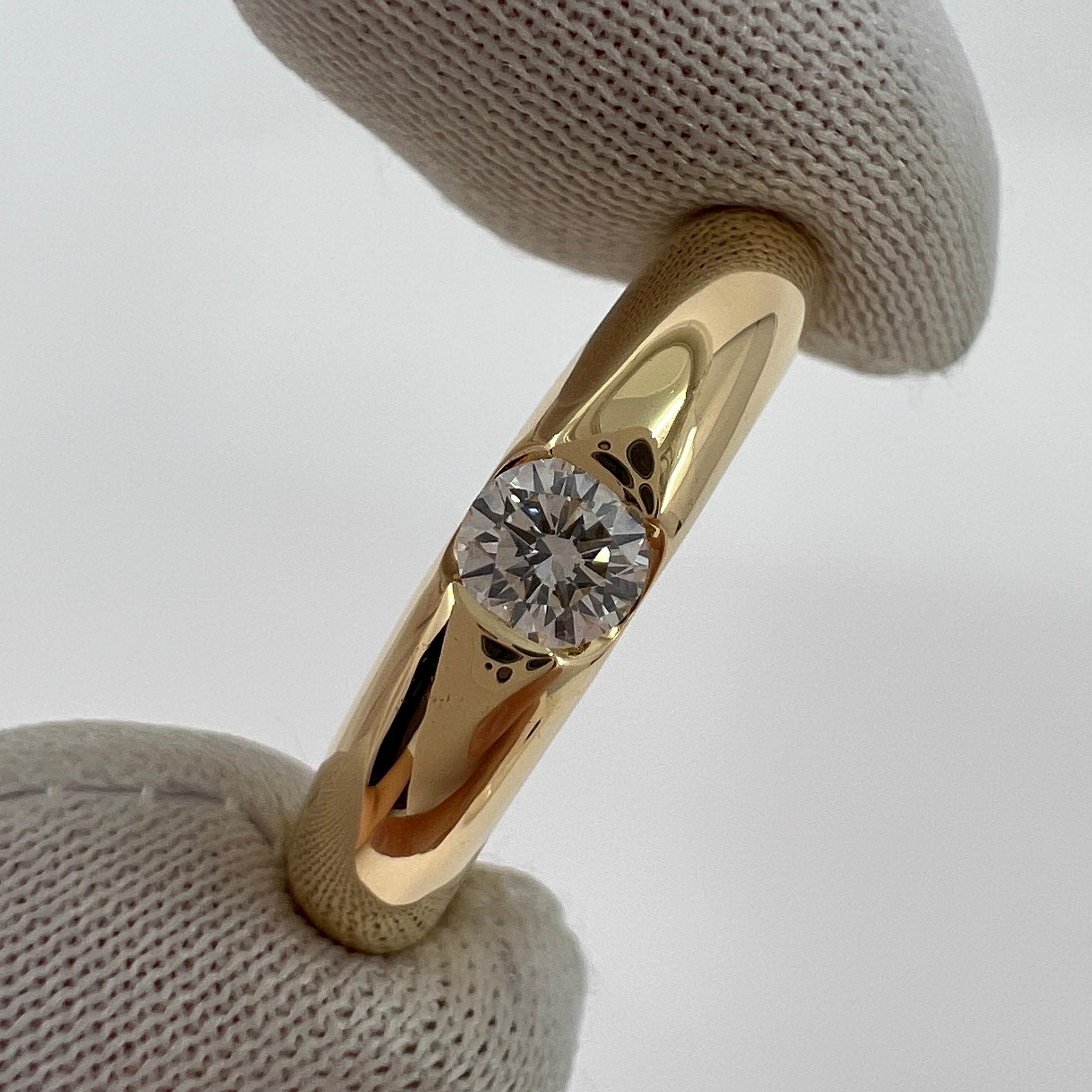 Vintage Cartier Round Brilliant Diamond 18k Yellow Gold Solitaire Ring.

Superbe bague en or jaune sertie d'un diamant rond de 0.25ct. Couleur E, pureté VVS1, excellente taille ronde et brillante.
Les maisons de haute joaillerie comme Cartier