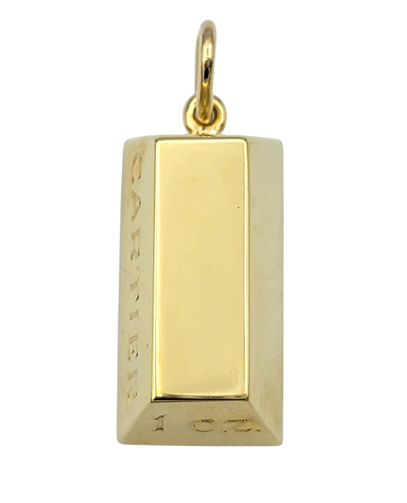 Immerse yourself in the timeless allure of luxury with this breathtaking Cartier 1 oz. gold bar pendant. Crafted in rich, lustrous 18 karat yellow gold, this polished pendant exudes sophistication and refinement, a true emblem of Cartier’s legendary