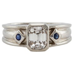 Platinring mit 1,20 Karat Diamant im Smaragdschliff und Saphir im Smaragdschliff von Cartier