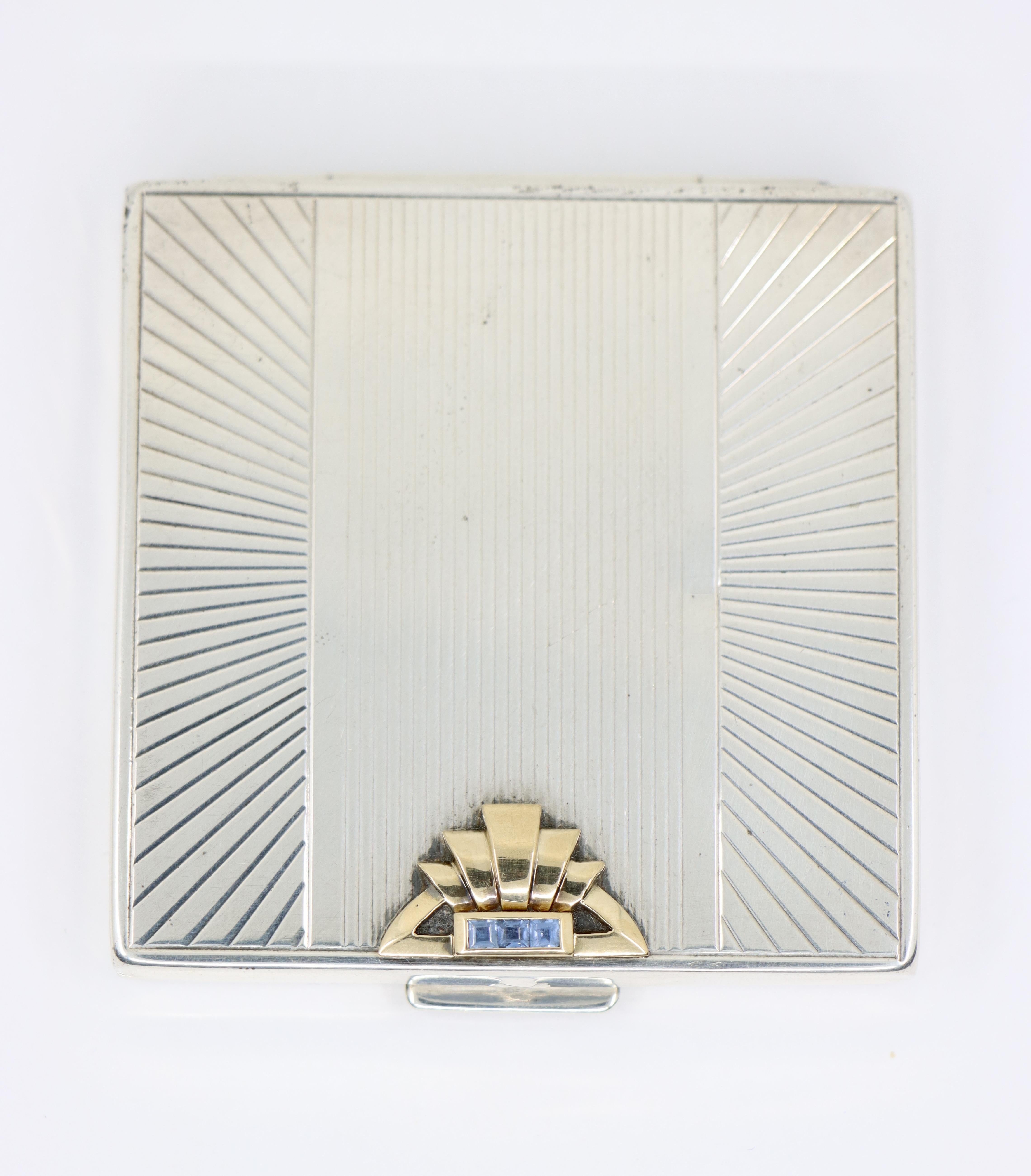 Vintage Cartier 14K Gold & Sterling Sapphire Compact Case

Marked:
CARTIER
STERLING & 14K

Approximate Dimensions:
5.8 cm (Length) 
5.8 cm (Width)
84.8 grams in weight.