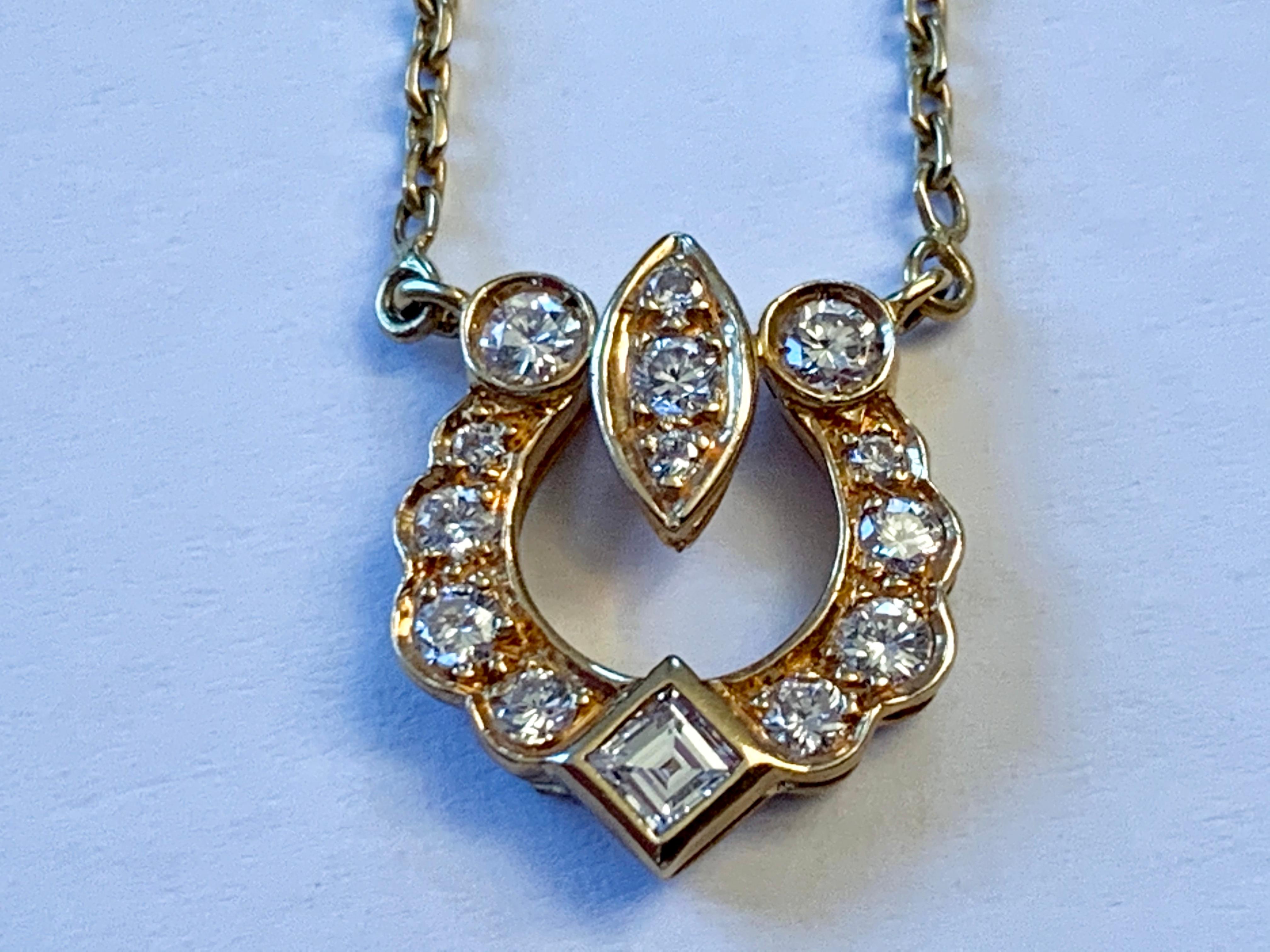 18 K yellow Gold Pendant with integrated chain, signed Cartier. Set with 14 Diamonds G color, vs clarity of approximately 0.60 ct. . Safety chain. Length 41.5 cm. 5.08 grams. 