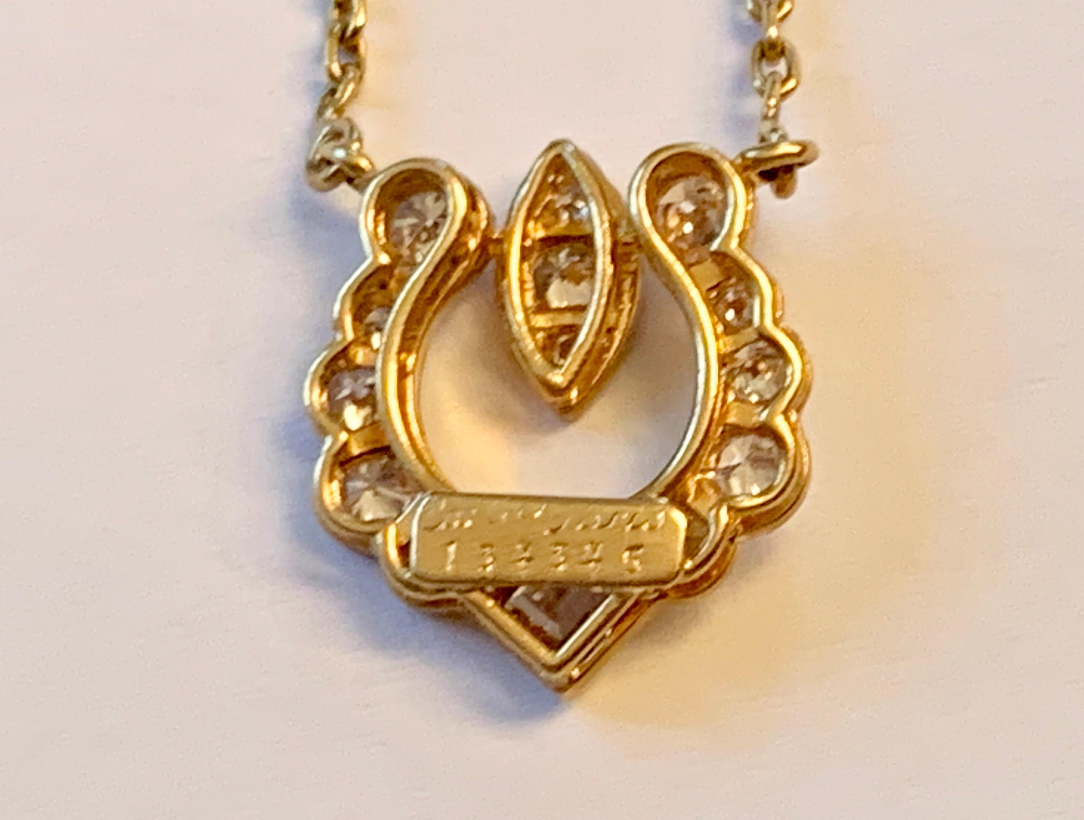 Contemporary Vintage Cartier 18 Karat Yellow Gold Diamond Pendant with Chain