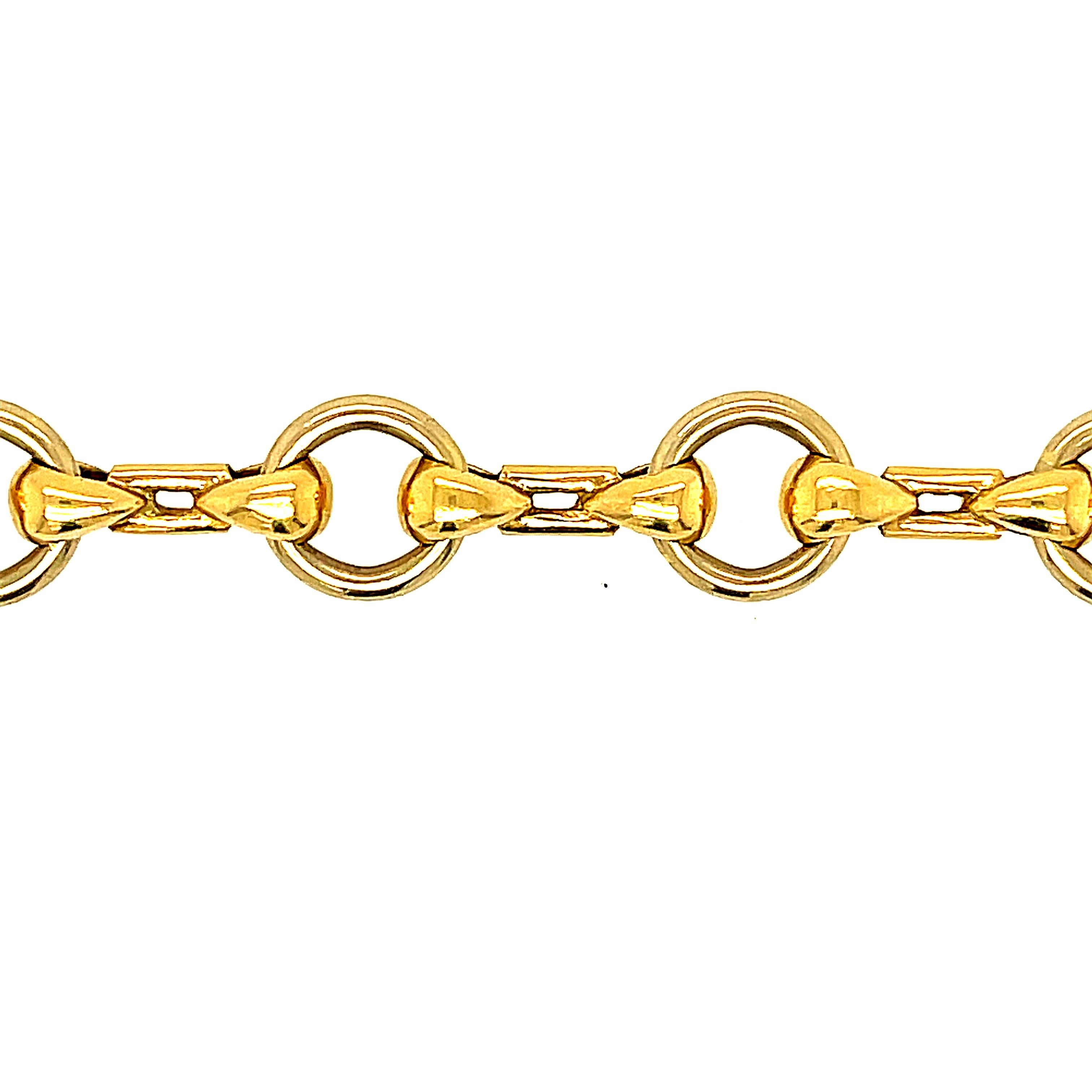 A vintage 18k yellow gold circular link bracelet by Cartier circa 1980. This easy open link is perfect for wearing everyday, layered with other bracelets or perhaps to hang a charm. It is such a versatile link. The bracelet is 7.5 inches long. It is