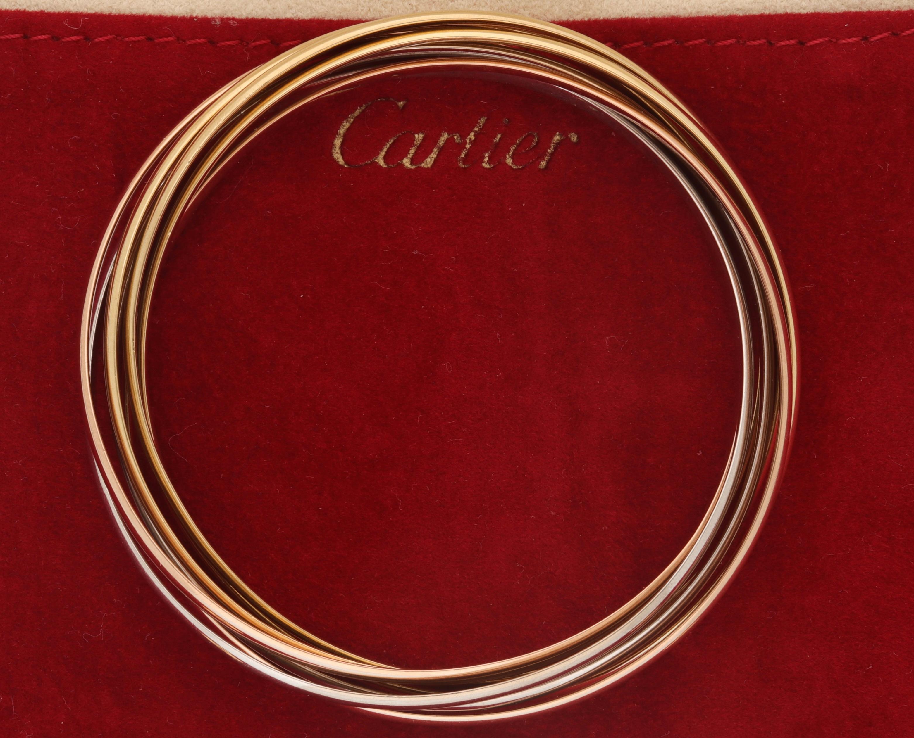 Vintage Cartier 18 Kt. Three-Tone Gold Trinity Rolling 7 Bangle Bracelet In Excellent Condition In Rome, IT