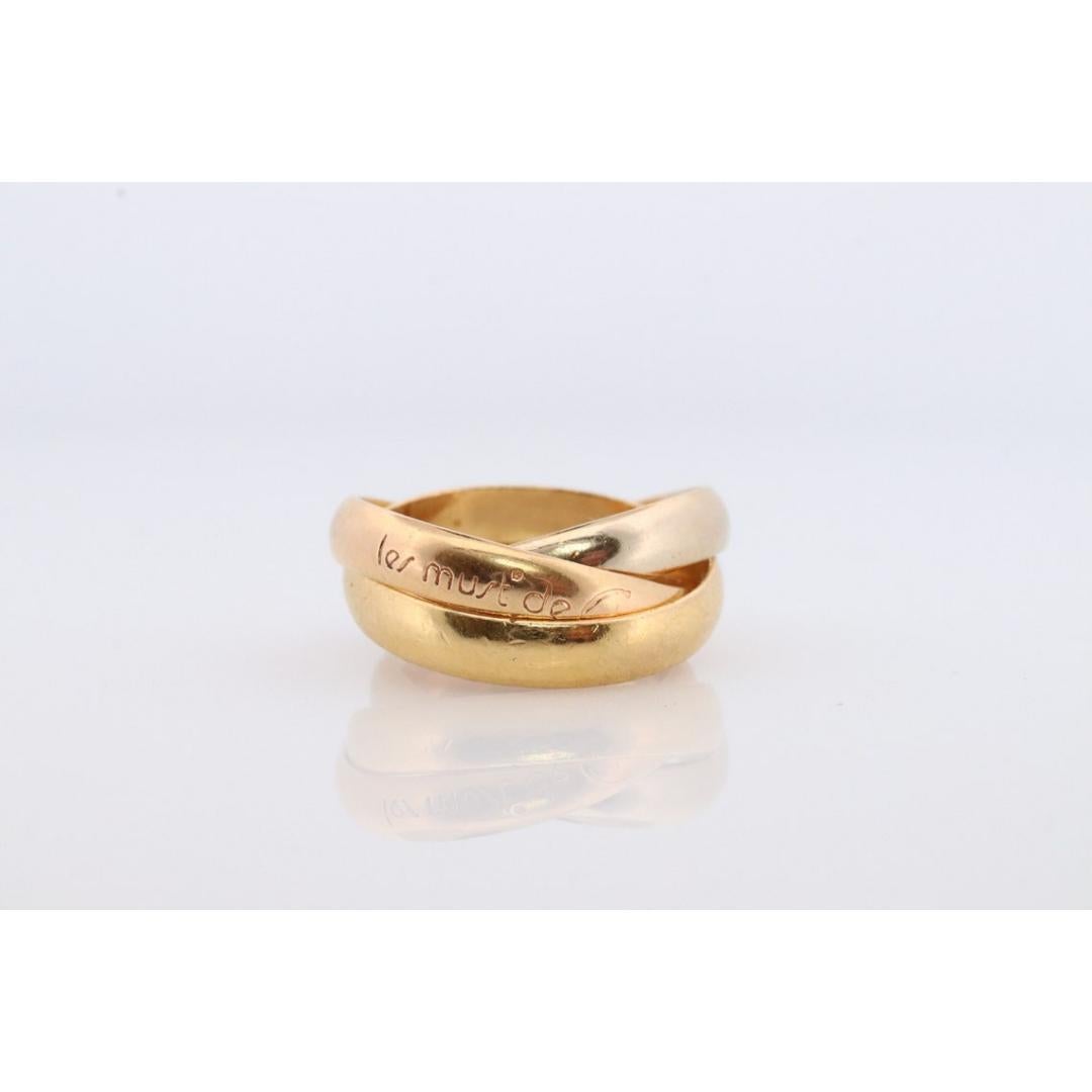 Donna Cartier 18k 750 Tricolor Rolle d'epoca. Anello triplo Must de Cartier. in vendita