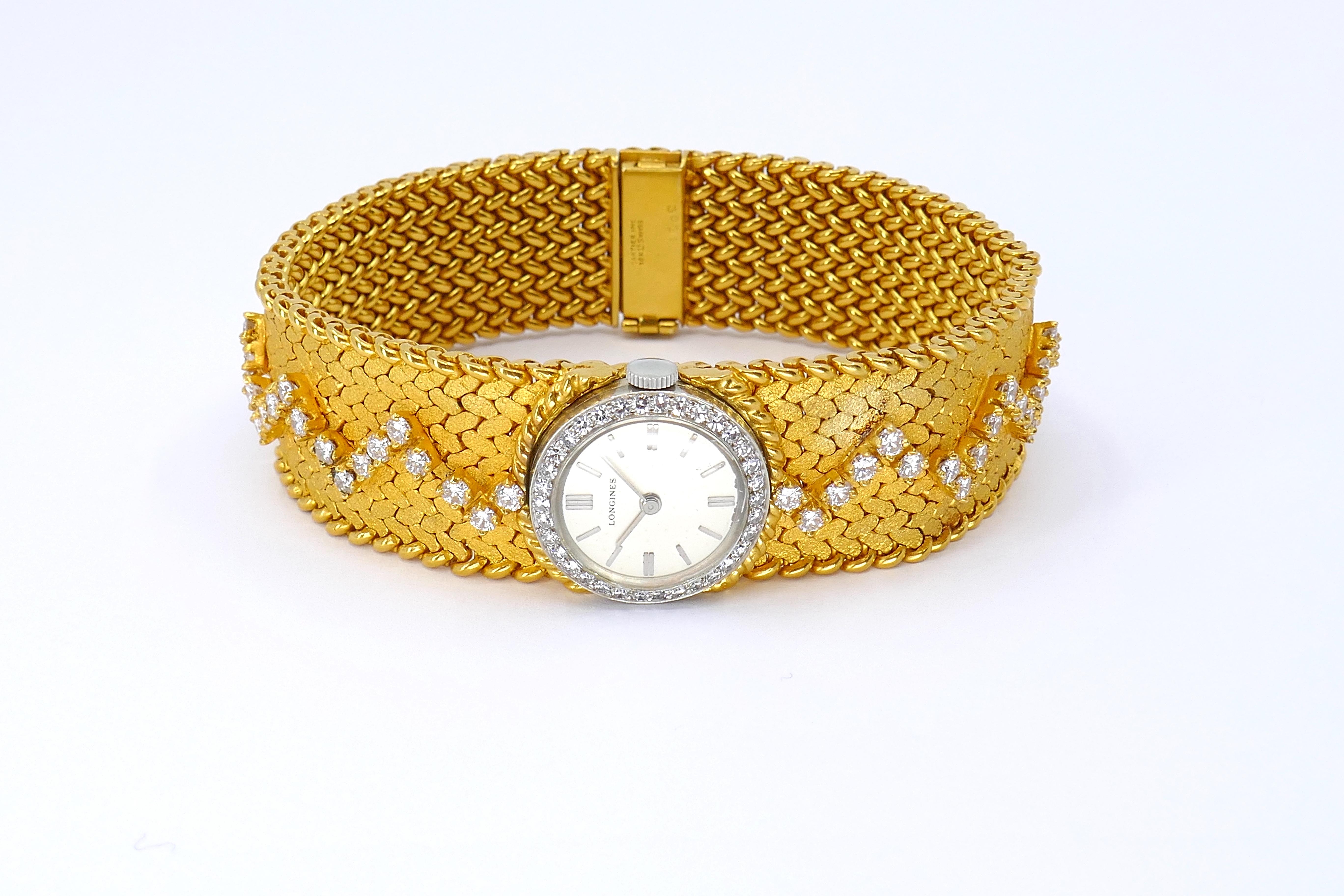 Cartier 18 Karat Yellow Gold Diamond Longines Movement Wristwatch

Company: Cartier
Movement: Longines
Metal: 18k Yellow Gold
Condition: Excellent
Year Of Manufacture: Circa 1940s
Length:7.5 inches
Gemstone: Diamond
Diamond weight: 4 CT 