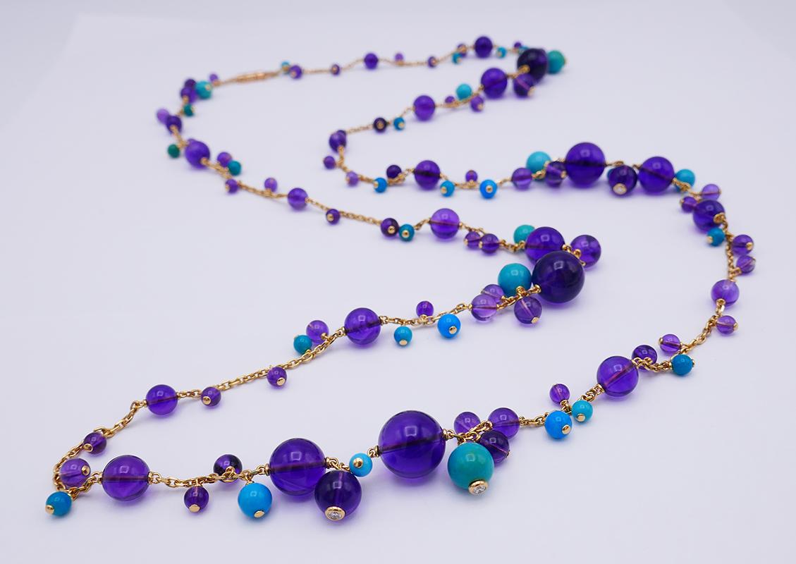 Colorful vintage necklace created by Cartier in the 1980s. It belongs to a Delices De Goa collection.
Made of 18 karat yellow gold, turquoise and amethyst beads and diamond accents.
Measurements: 37