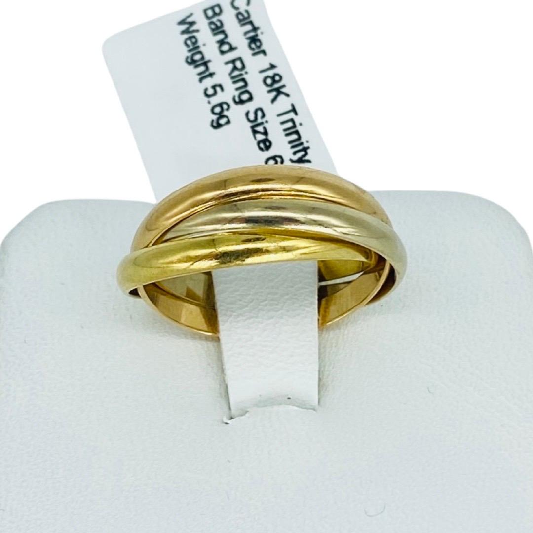 Vintage Cartier 18K Gold Trinity Band Rings.
Each ring measures 2.65mm in height. The ring is stamped Cartier 750 55
The ring is a size 6.5 and weights 5.6 grams
100% authentic 