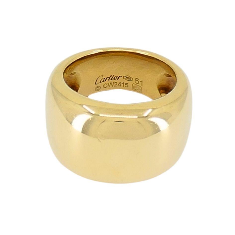 This Cartier Paris Nouvelle Vague 18k gold dome ring is a timeless statement piece from the 1990s. Crafted in rich 18-karat yellow gold, the ring features a bold, sculptural design with a smooth, high-polish finish that reflects light beautifully.