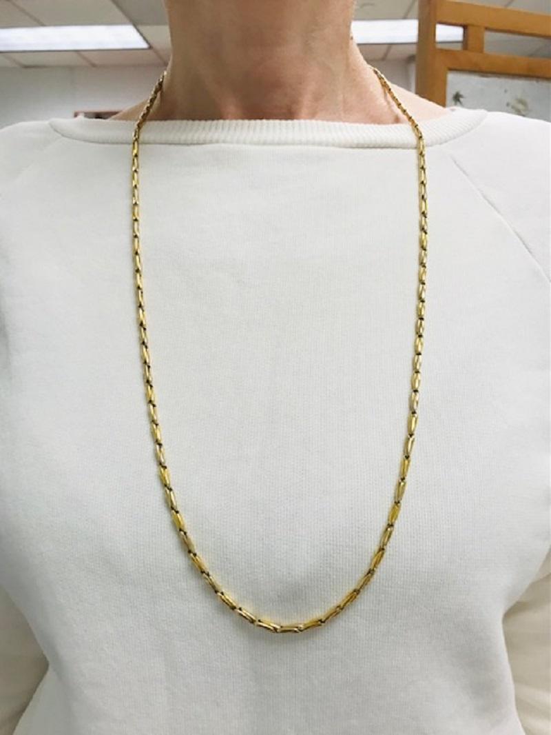 A rare vintage Cartier 18k gold chain necklace with the barleycorn link. The gold is two-tone, yet the hues are just slightly different and not contrast. The chain is long enough (30