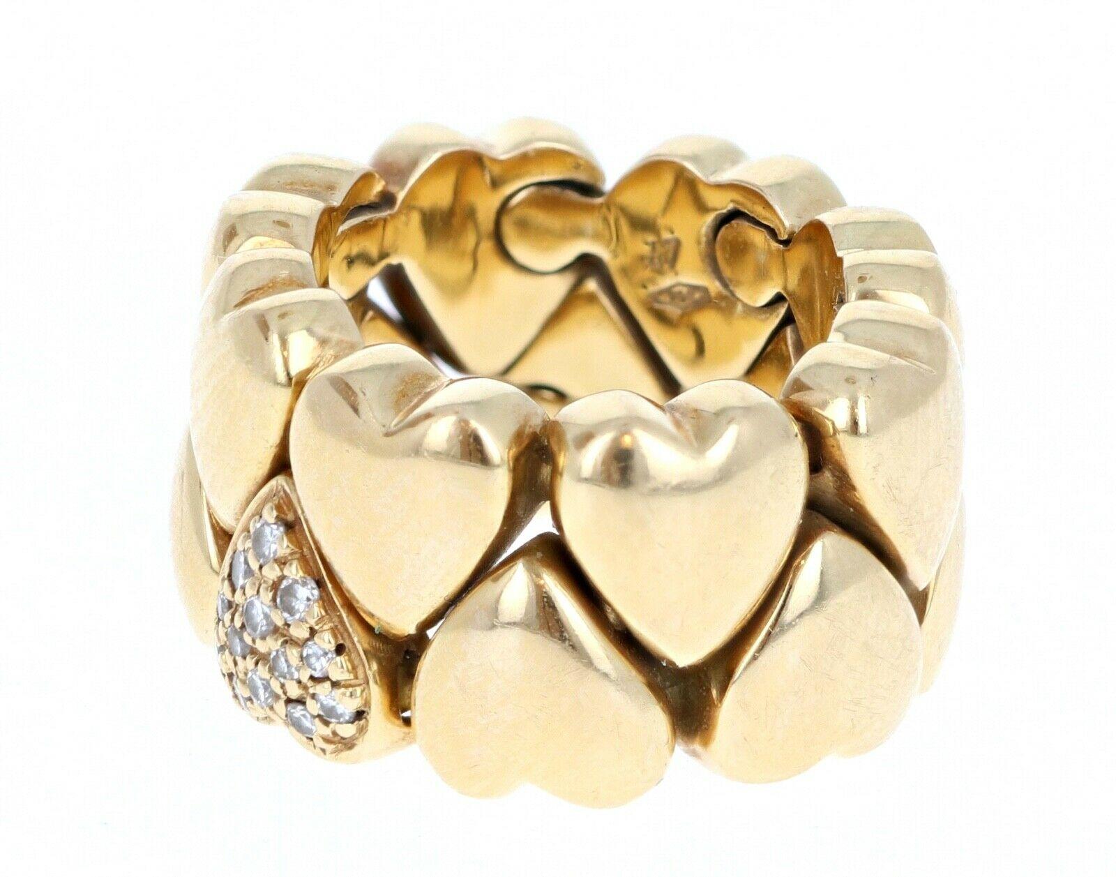 Vintage 1995 Cartier 18K Yellow Gold Puffy Heart Diamond Ring Size 47

For sale is a Cartier 18k yellow gold puffy heart ring. The ring is crafted in 18k yellow gold and features alternating puffy hearts. There Is one micro pave diamond heart on the