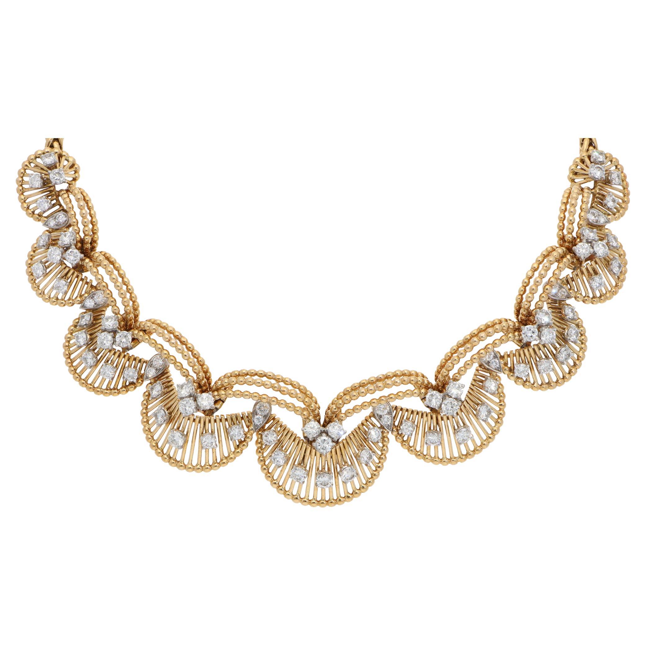 A beautiful vintage Cartier diamond necklace set in 18k yellow gold, circa 1950-1960.

From Cartier’s discontinued collection, the necklace is set in a unique pattern with 86 round brilliant-cut diamonds. It is beautifully handcrafted with beaded