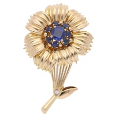 Vintage Cartier 1960s Sapphire Floral Brooch in Yellow Gold