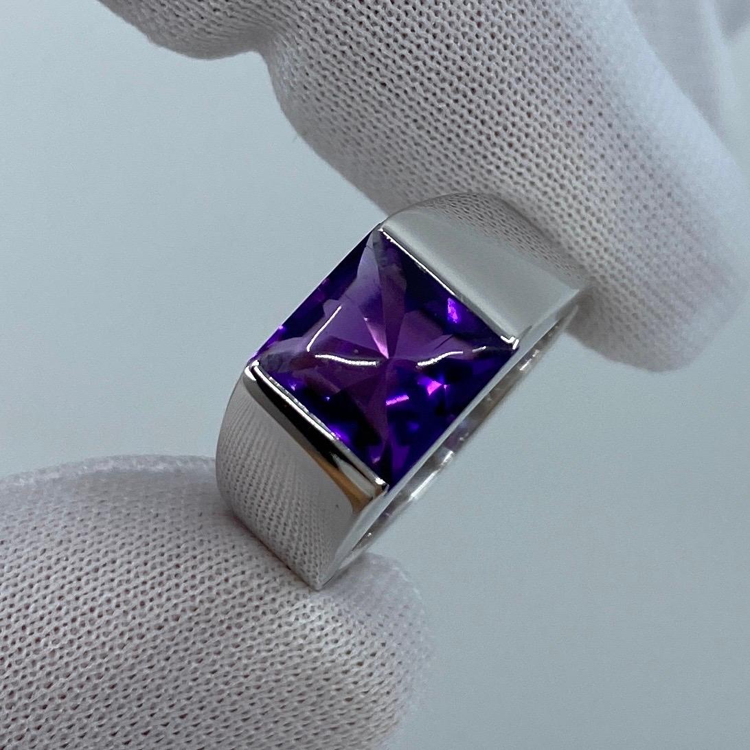 Cartier Purple Amethyst 18 Karat White Gold Tank Ring.

Stunning white gold ring with a large 8mm tension set deep purple amethyst. Fine jewellery houses like Cartier only use the finest of gemstones and this amethyst is no exception. A top amethyst