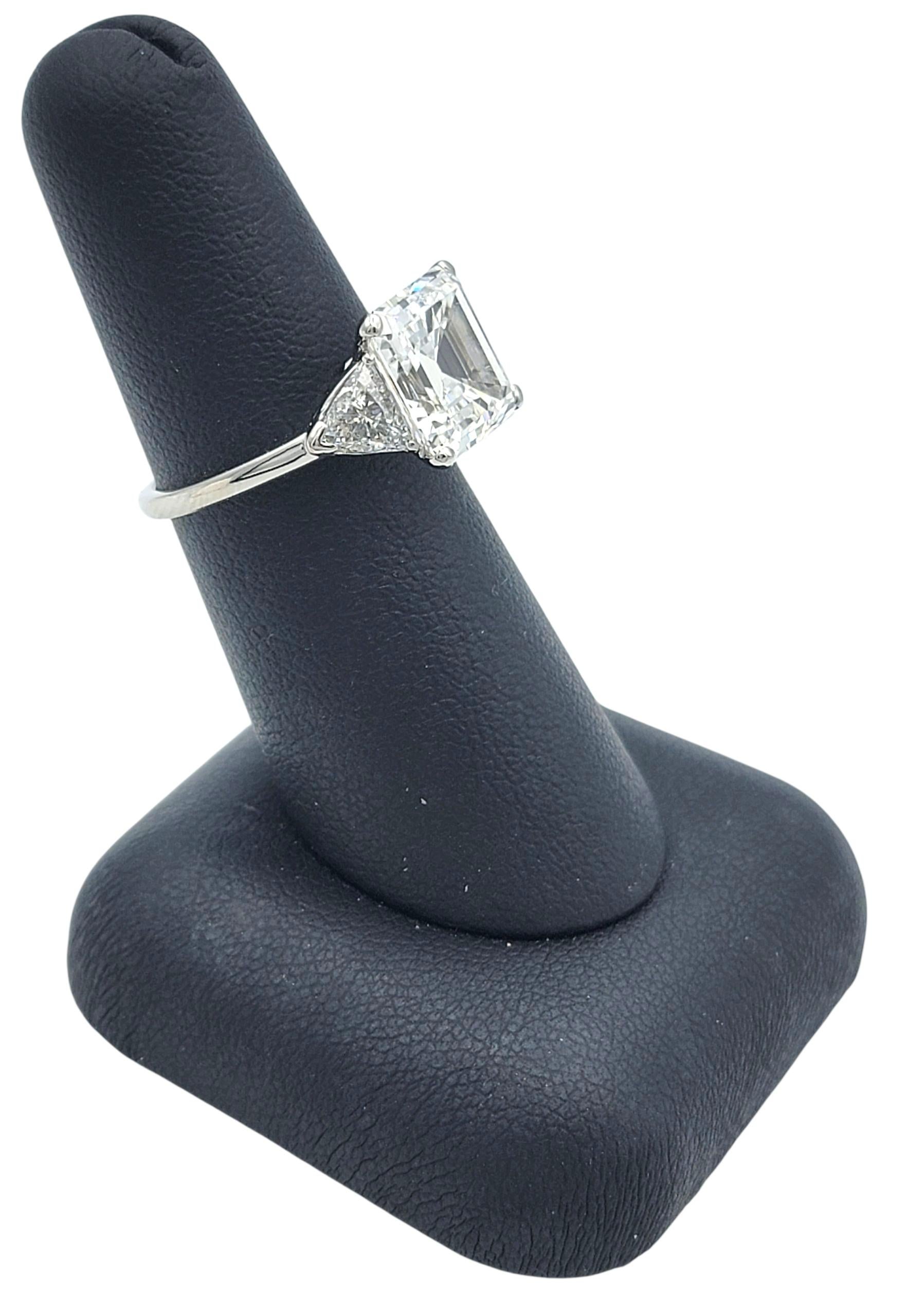 Vintage Cartier 5,36 Karat Total Square Emerald Cut 3-Stein Verlobungsring im Angebot 10