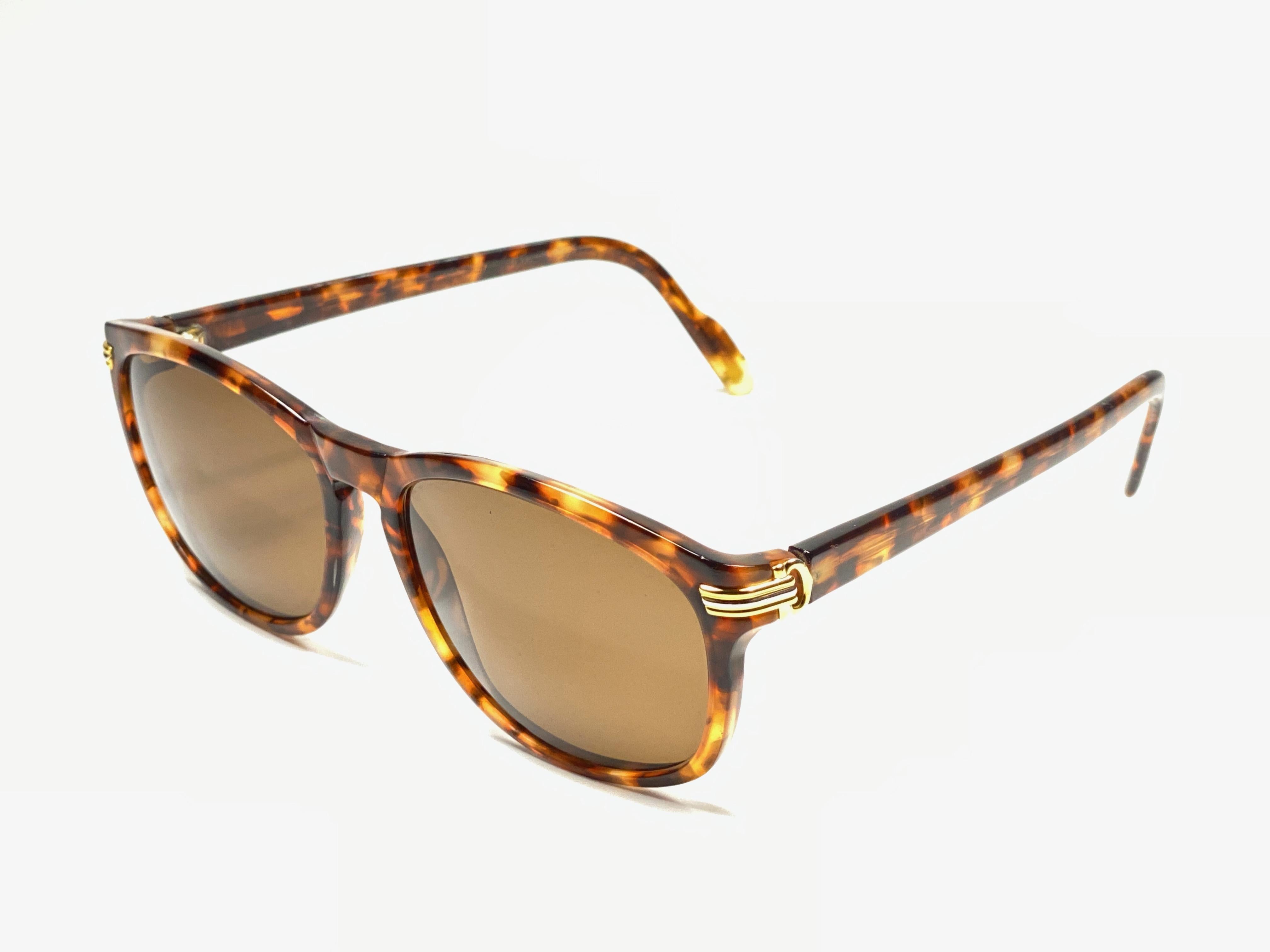 Women's or Men's Vintage Cartier 57[]17 Dark Tortoise Gold Plated Accents 1990 Sunglasses France