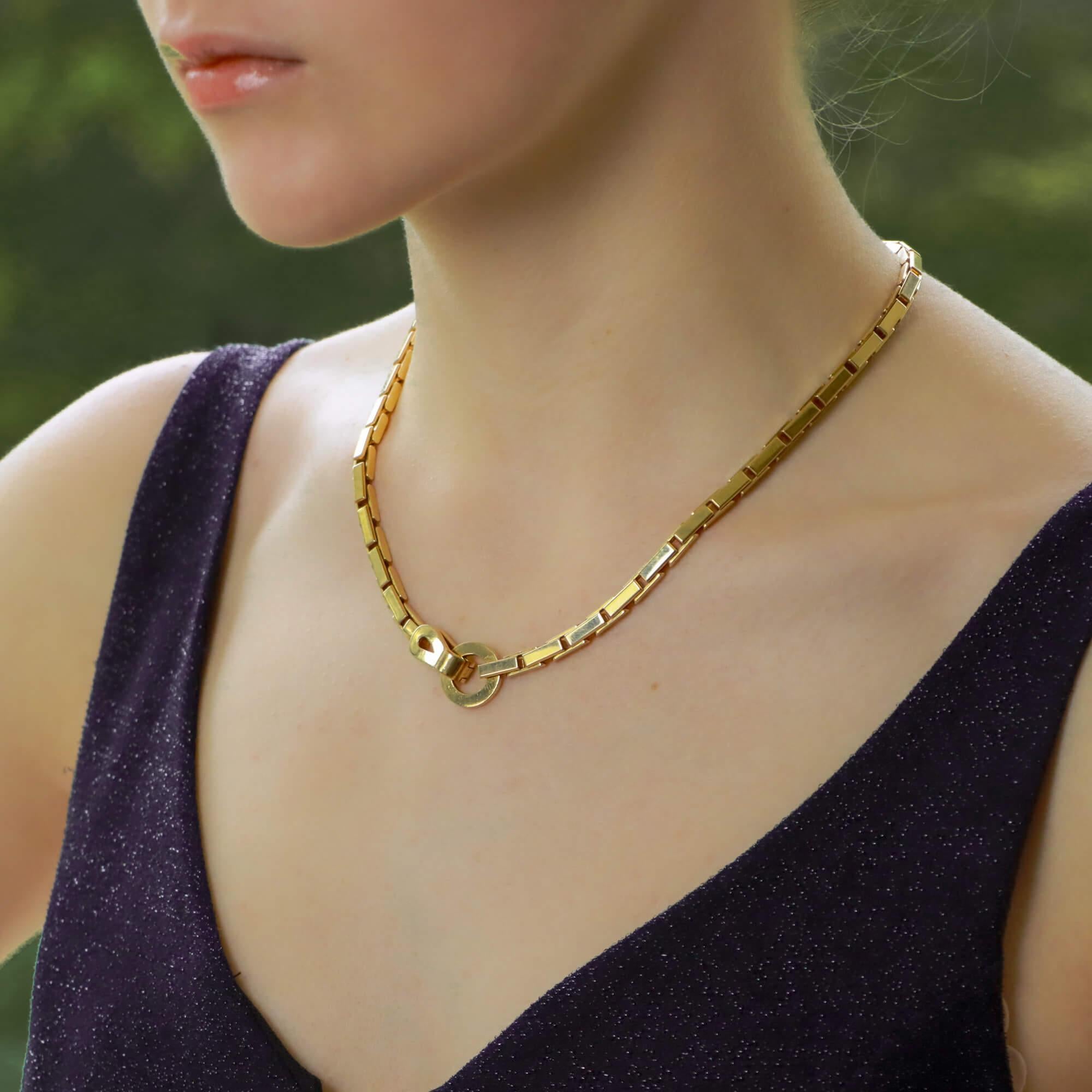  A beautiful vintage Cartier ‘Agrafe’ chunky chain necklace set in 18k yellow gold.

The piece is composed of an articulated chunky chain design which reflects the light elegantly whilst worn on the neck. The necklace is secured with a hinged hook