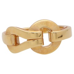 Cartier, bague Agrafe vintage en or jaune 18 carats sertie d'un anneau