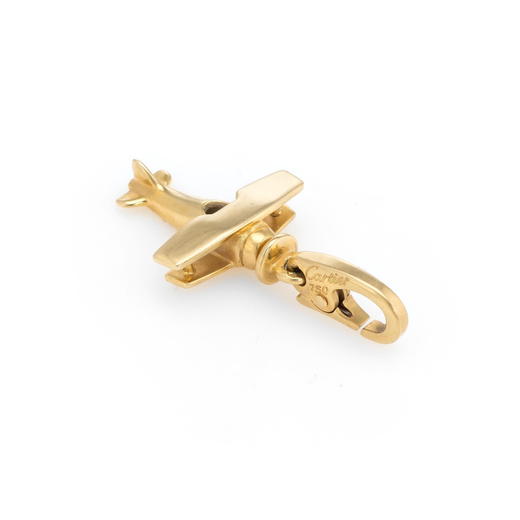 Vintage Cartier charm (circa 1996), crafted in 18 karat yellow gold.  

Also included is a Cartier Certificate of Authenticity. The charm was originally purchased at the Cartier boutique in Barcelona (1996).

The charm is in excellent condition.