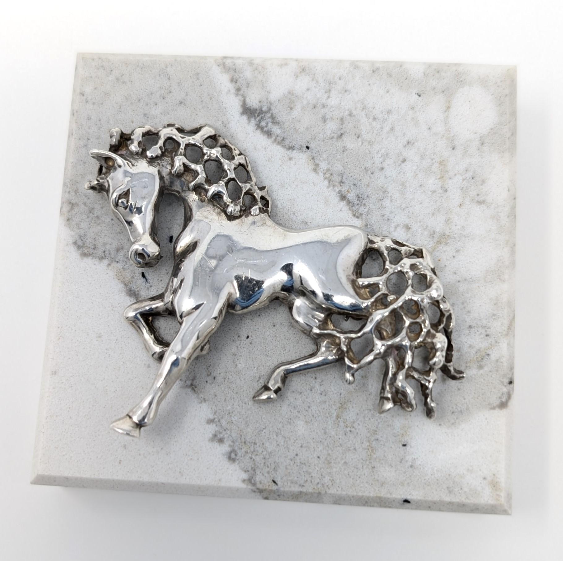 Rare vintage sterling silver horse brooch by Alwand Vahan for Cartier. This exquisite work of art shows the great craftsmanship of VAHAN, founded in 1968 by classically trained French designer Sacha Der Calousdian. Measures 2.1 inches in width by